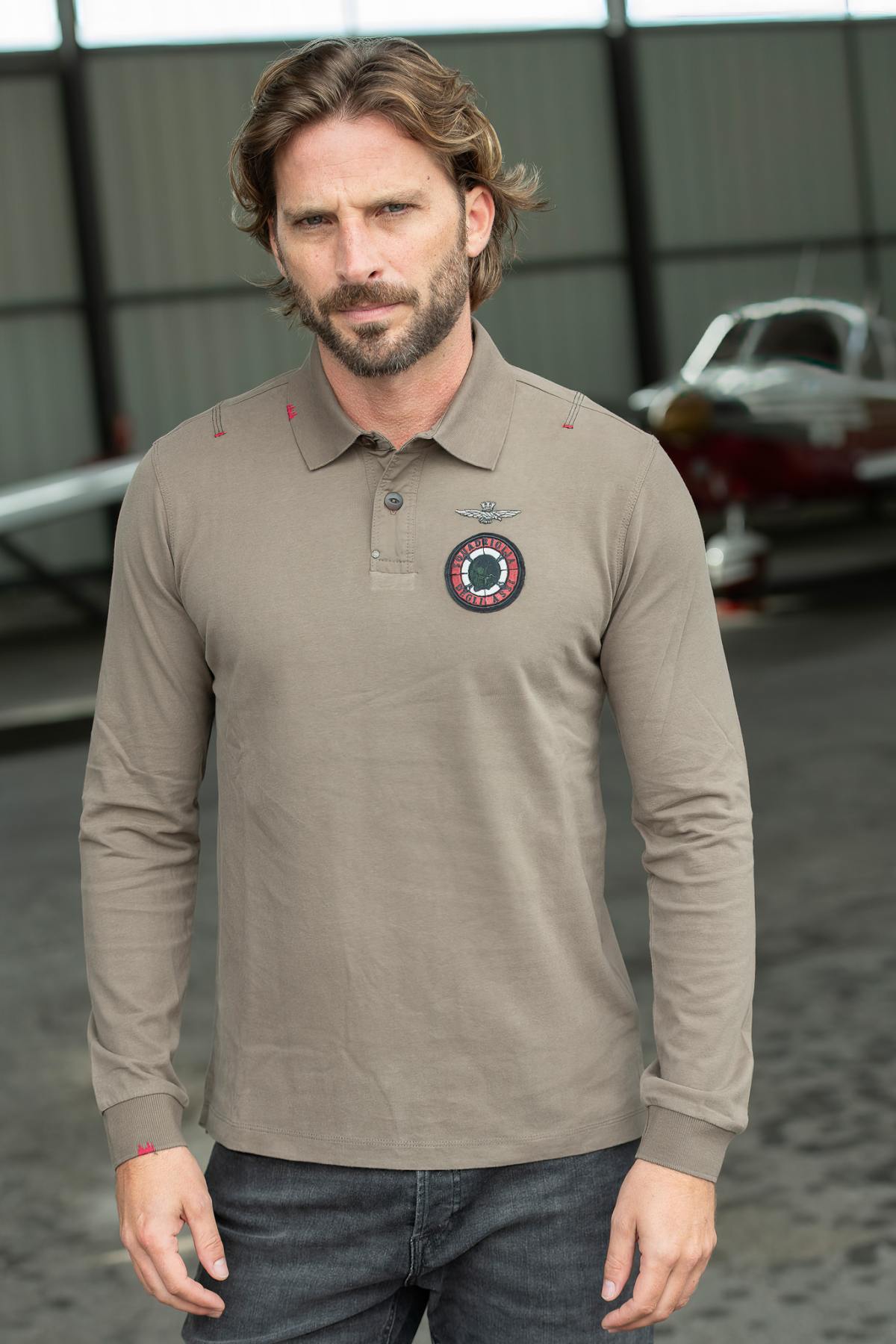 Long sleeve cotton polo shirt with heart badge - Image n°1