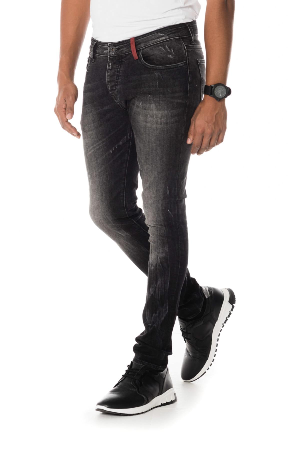 Distressed and washed slim-fit jeans - Image n°4