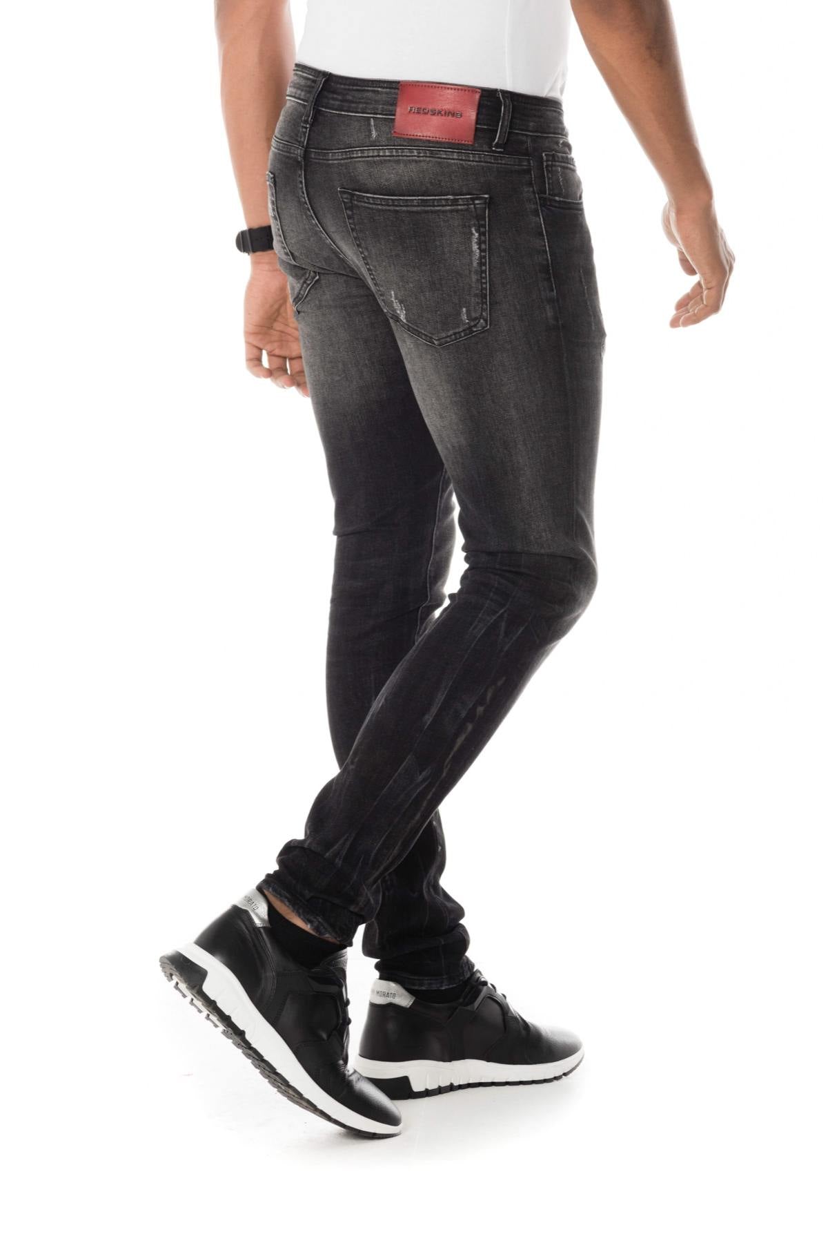 Distressed and washed slim-fit jeans - Image n°2