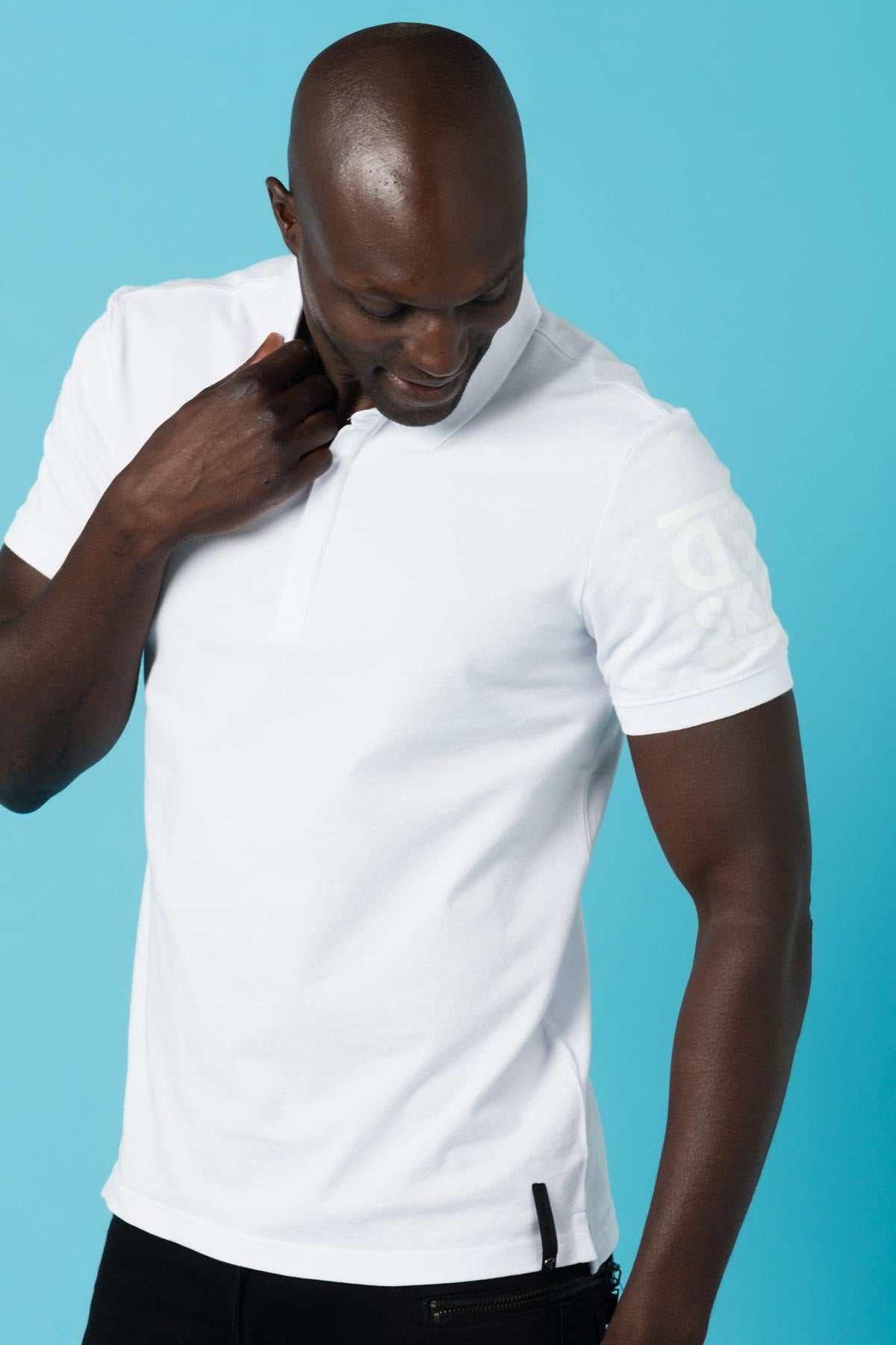 Men's white short-sleeved polo shirt - Image n°1