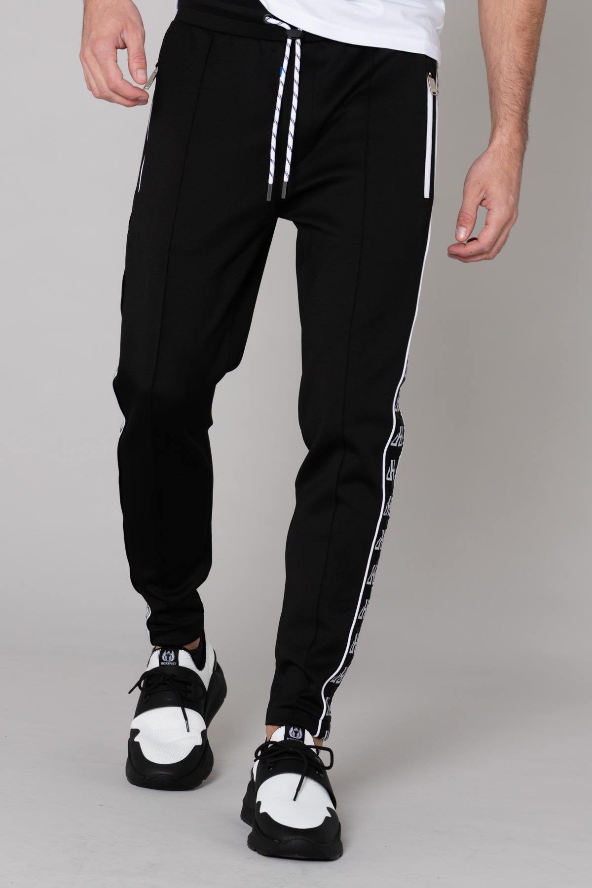 ̈Black jogging pants with white piping - Image n°1