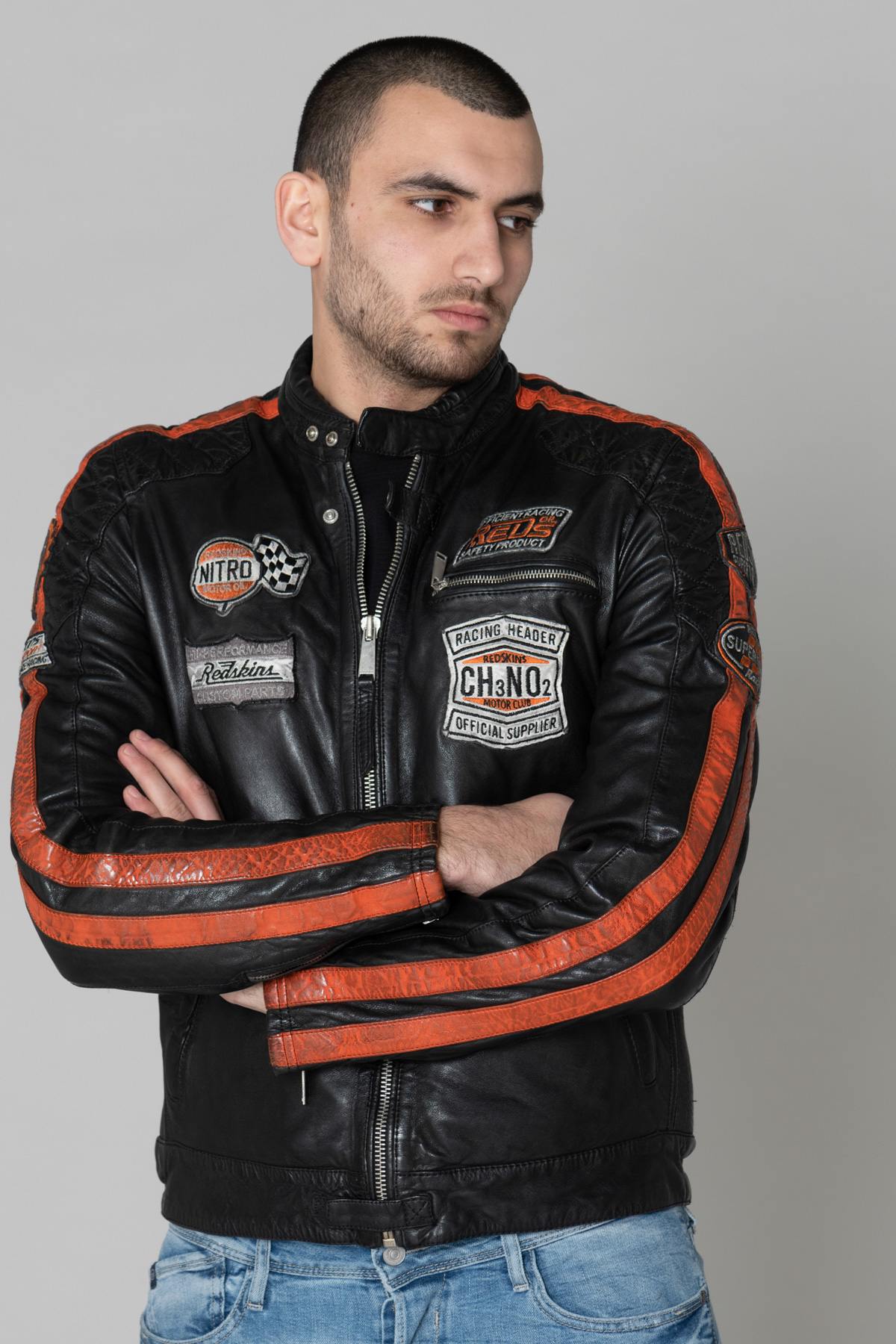 Black leather biker jacket with patches - Image n°1