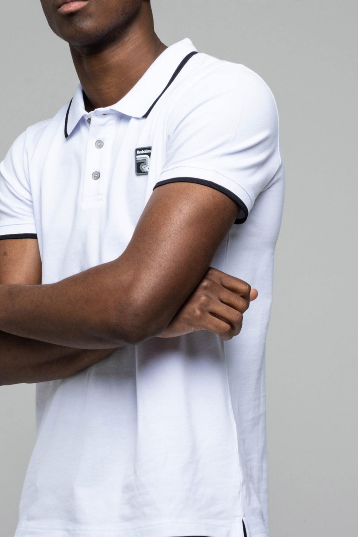 White polo shirt with black piping for men - Image n°1