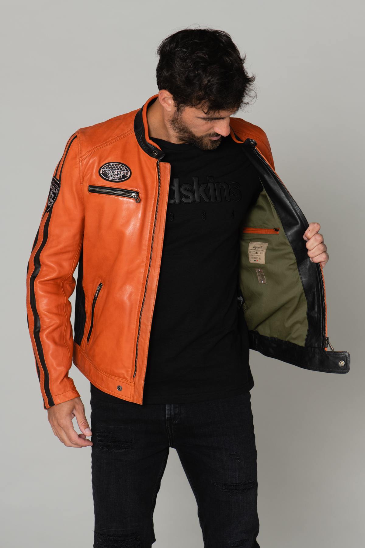 Orange and black leather biker jacket with patches - Image n°5