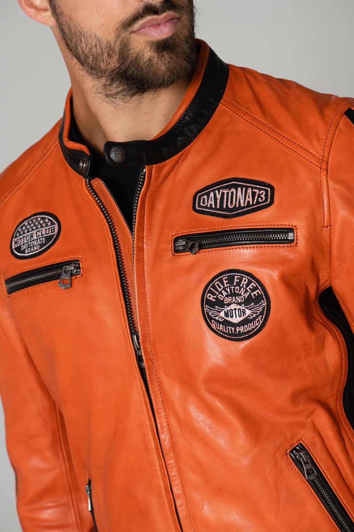 Orange and black leather biker jacket with patches - Image n°6