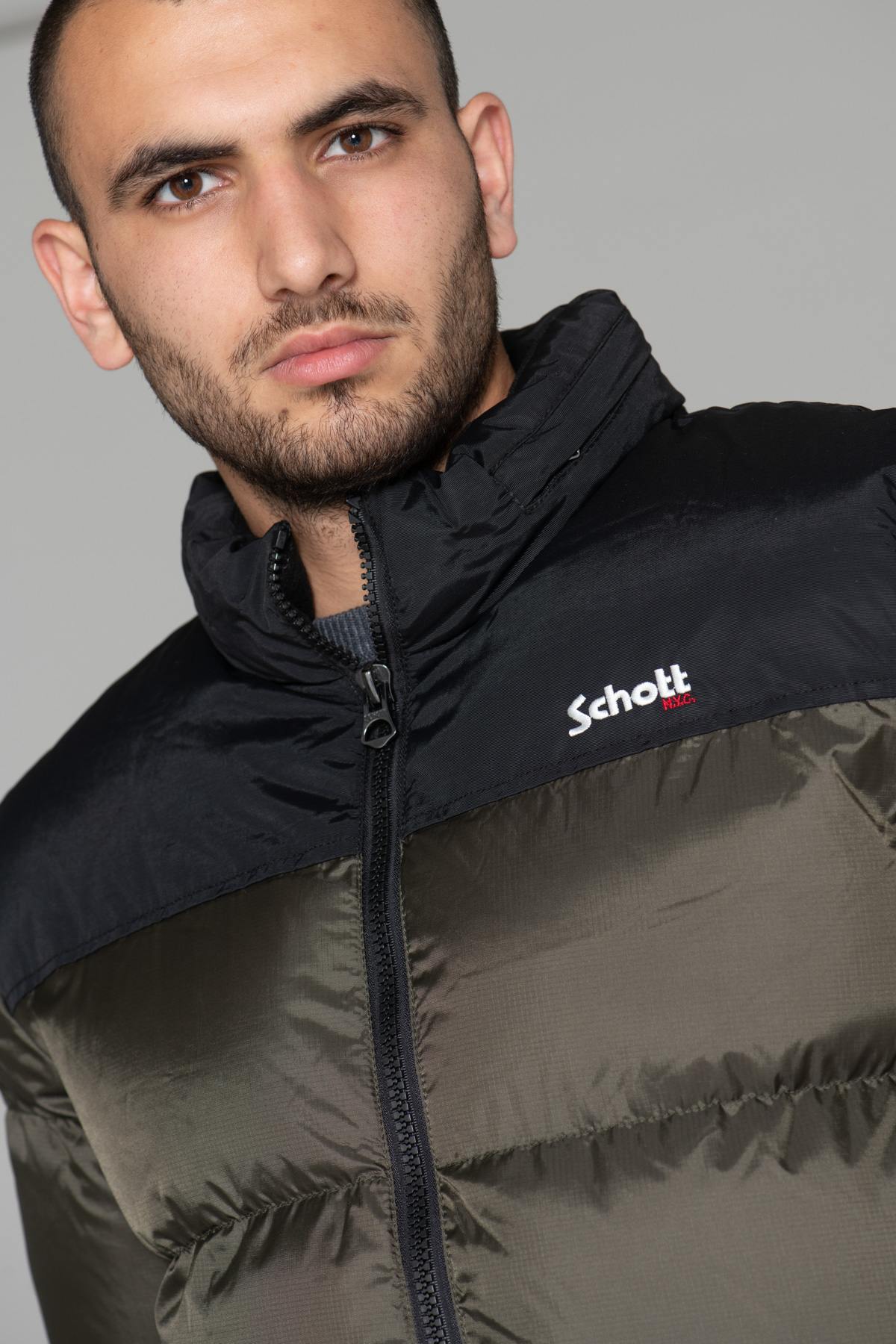 Khaki and black nylon down jacket - Image n°1