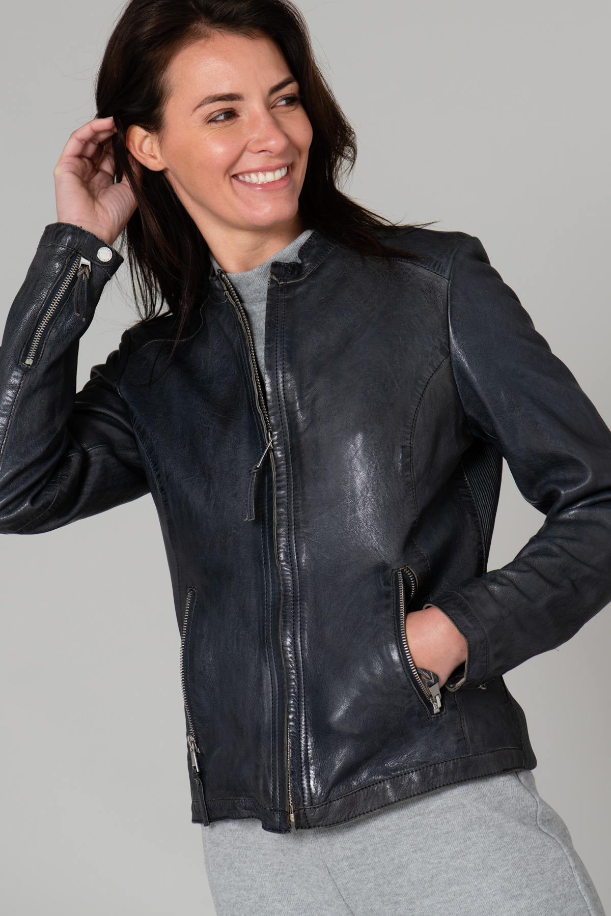 Women's navy blue leather jacket - Image n°1