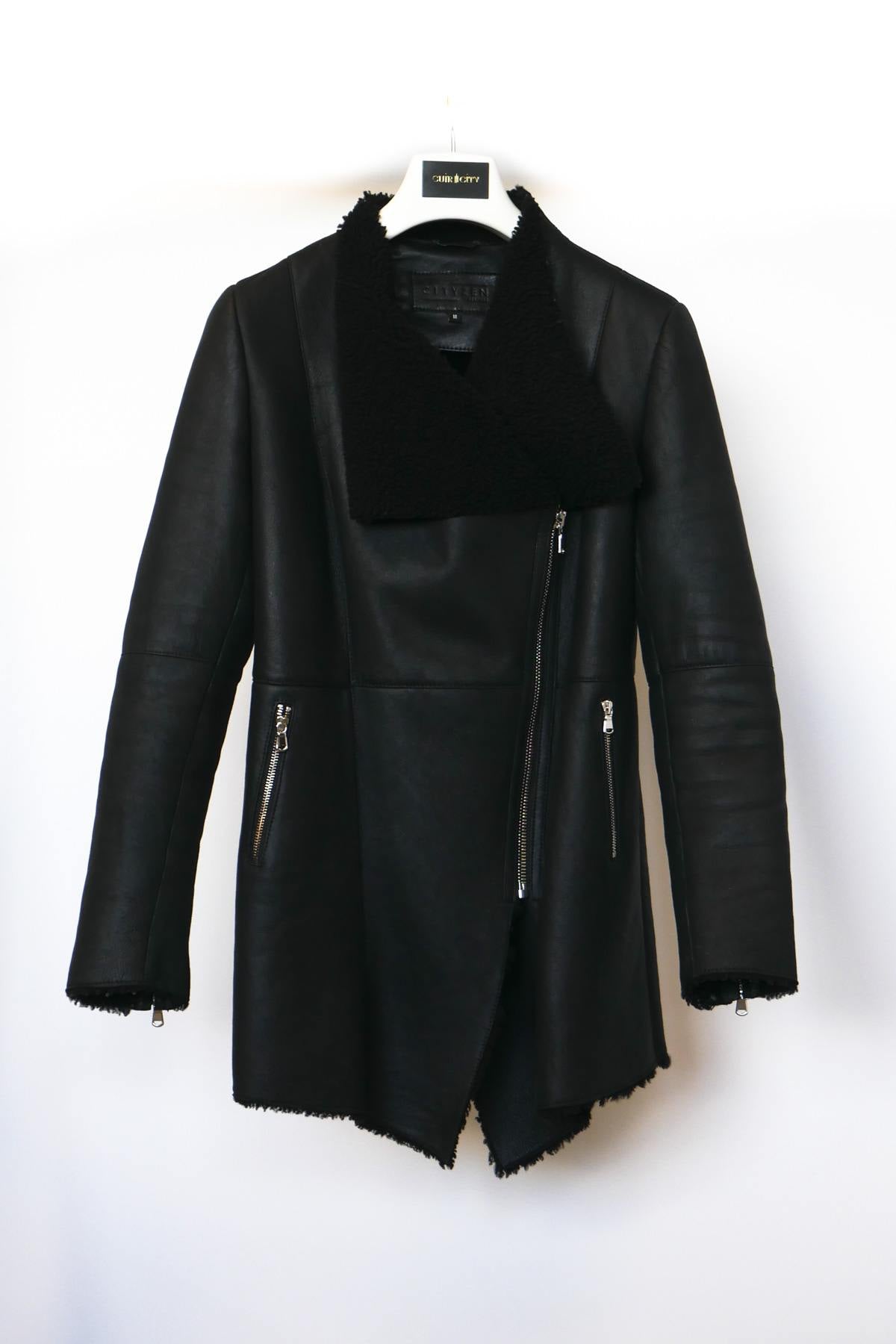 Women's mid-length black shearling jacket - Image n°1