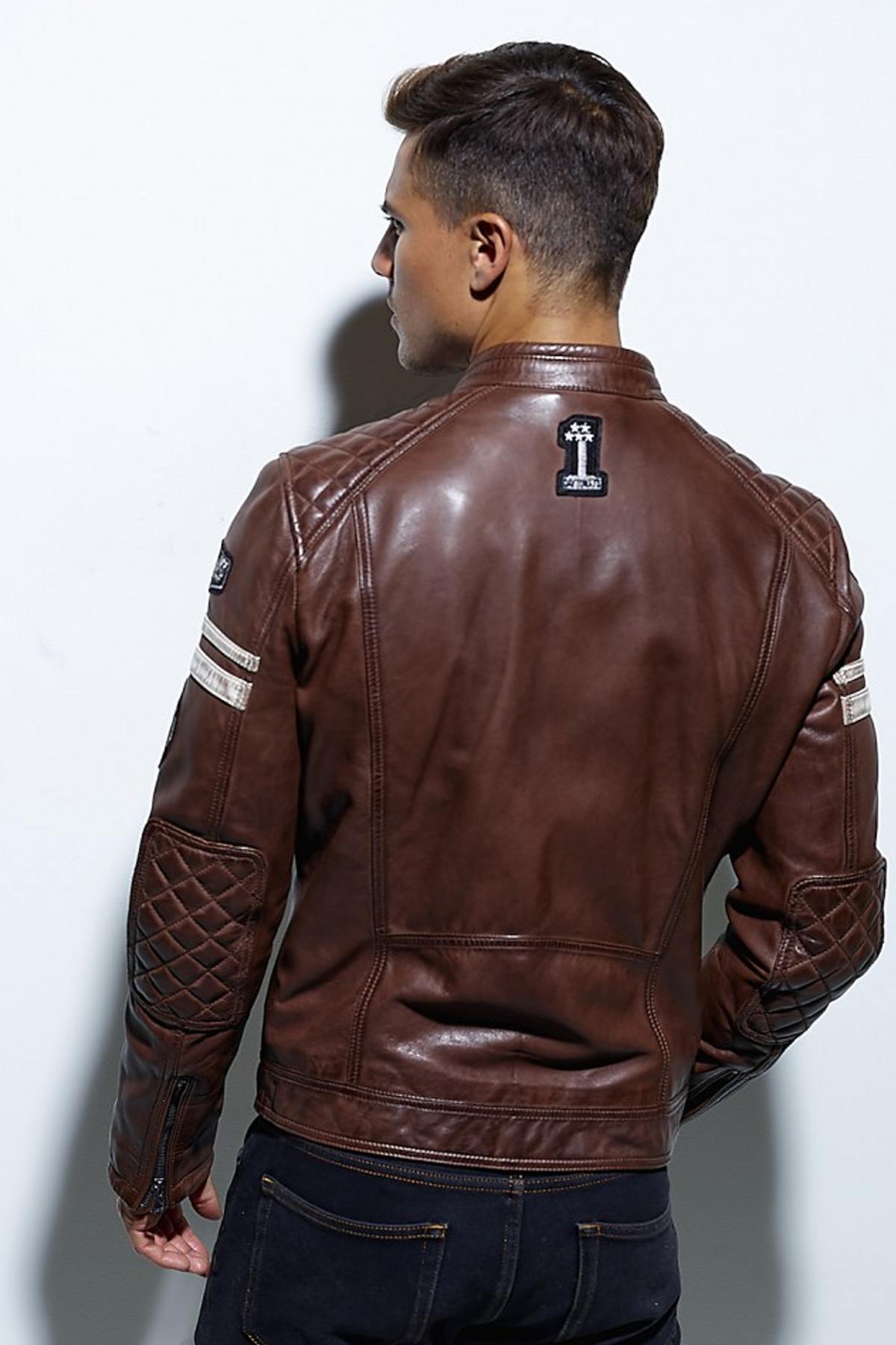 Leather jacket with vintage motorcycle patches - Image n°7