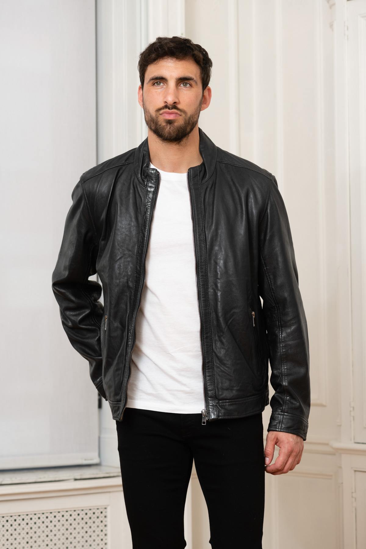 Dark blue leather jacket - Image n°1