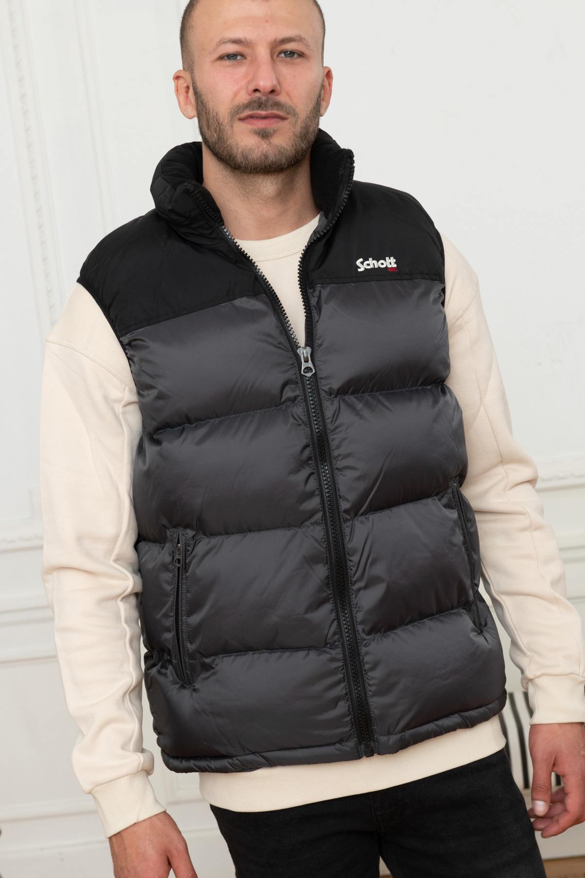 Gray and black sleeveless down jacket - Image n°3