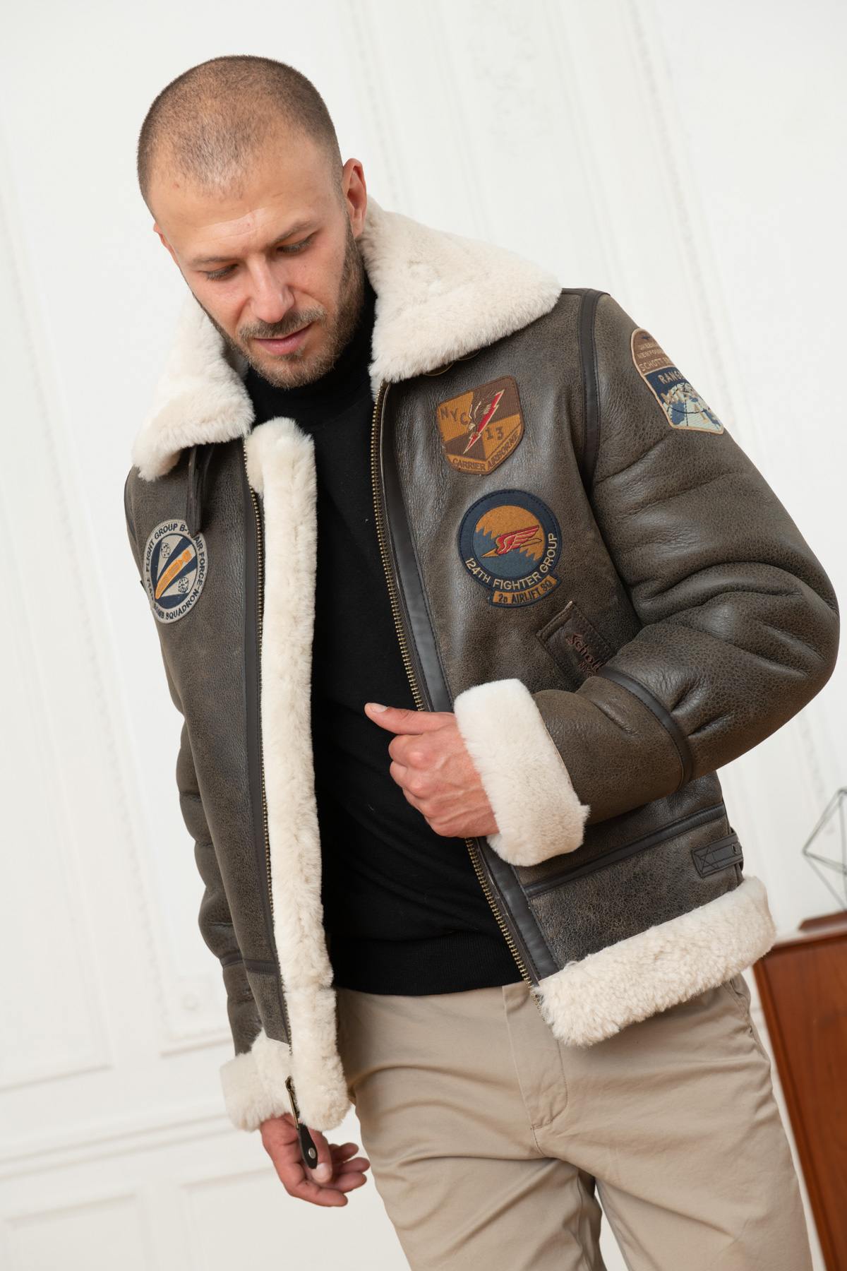 Bomber jacket in aged effect shearling - Image n°1