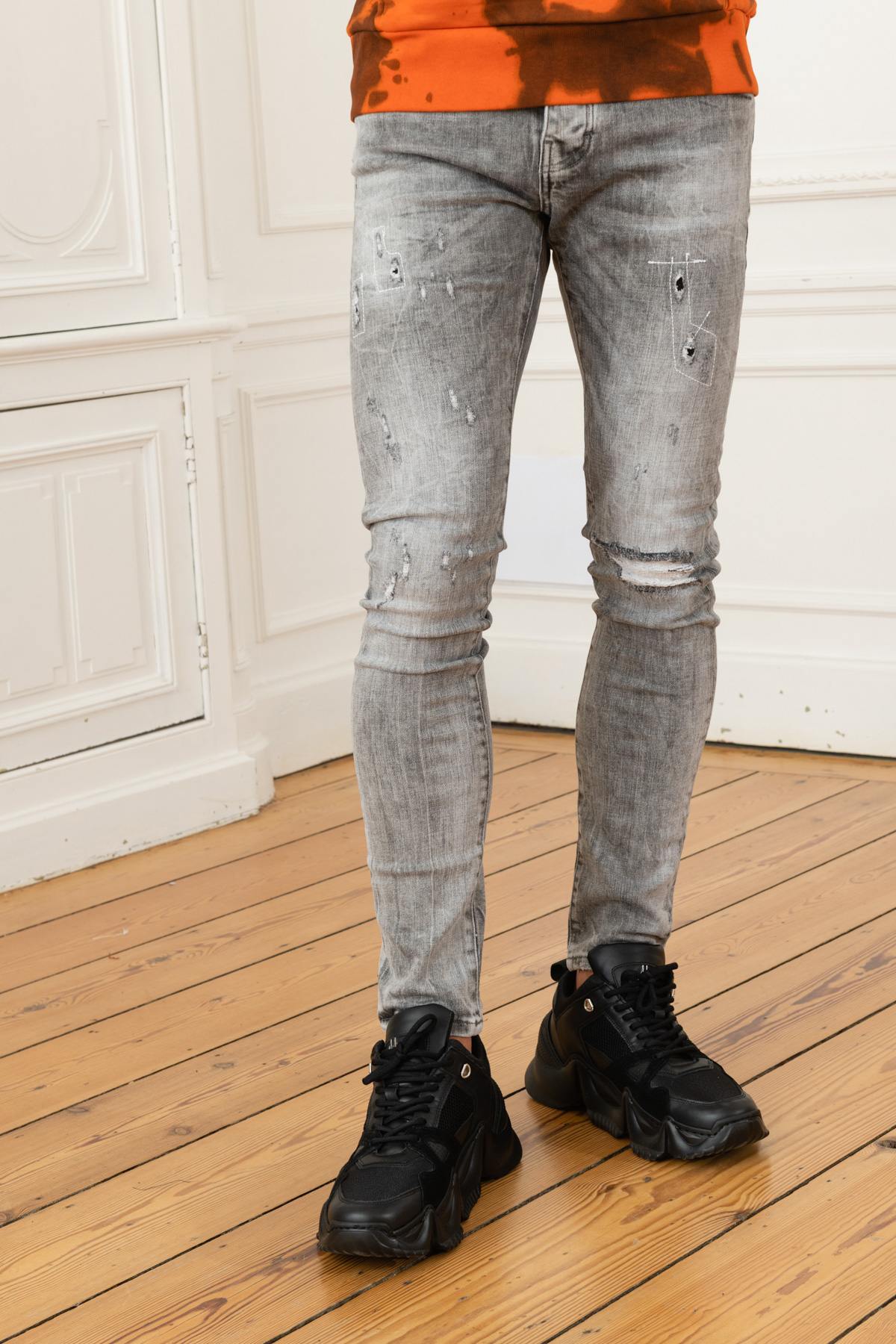 Destroyed washed gray skinny jeans - Image n°1