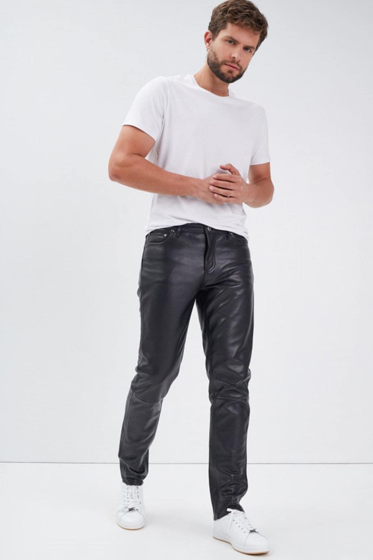 Regular-fit pants in shiny cowhide leather - Image n°1