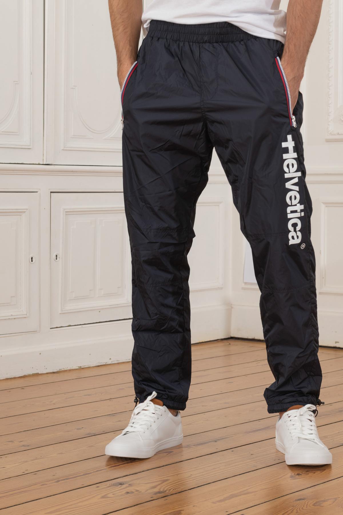 Flowy navy blue sportswear pants - Image n°1