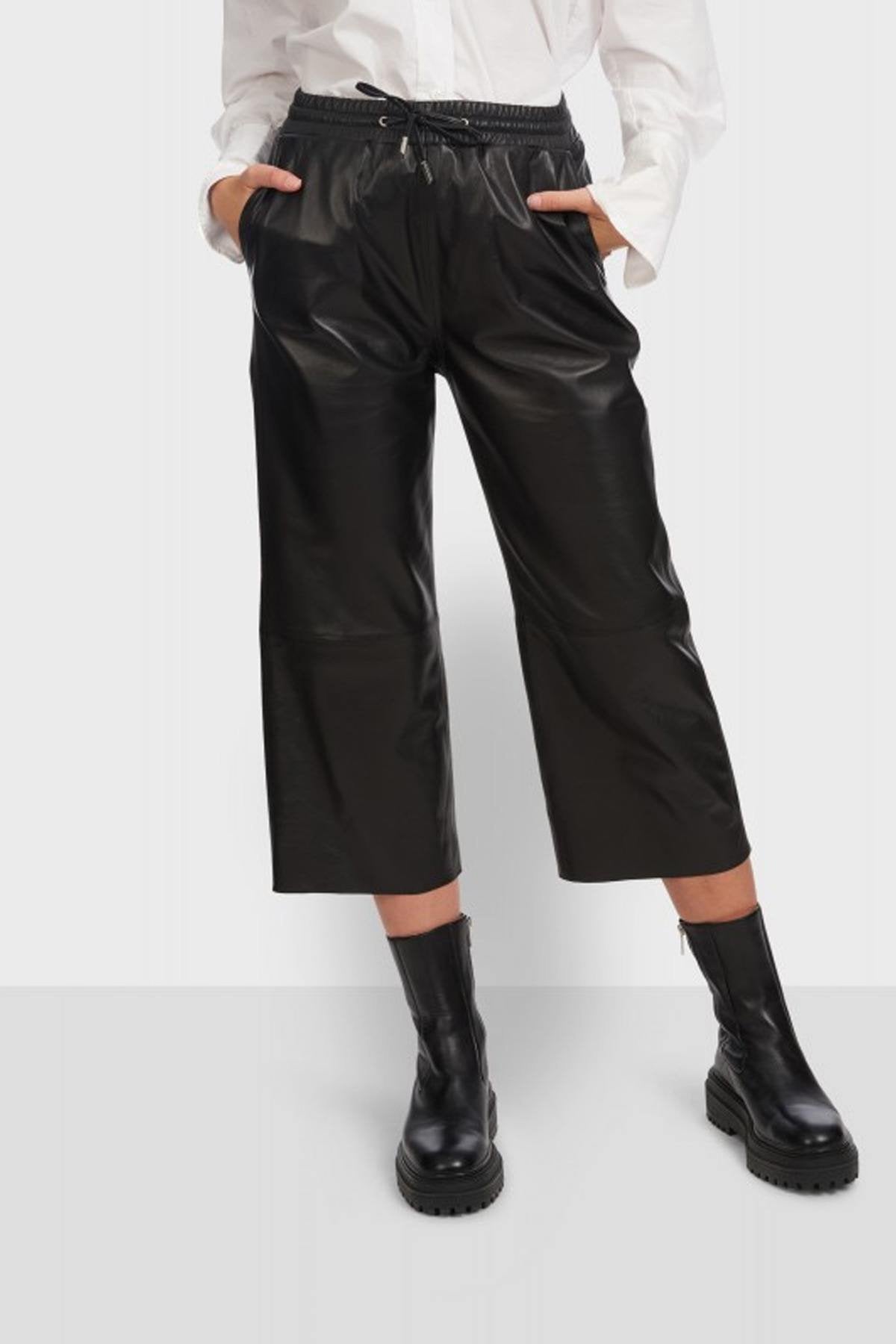 High-waisted 70s-style leather cropped pants - Image n°1