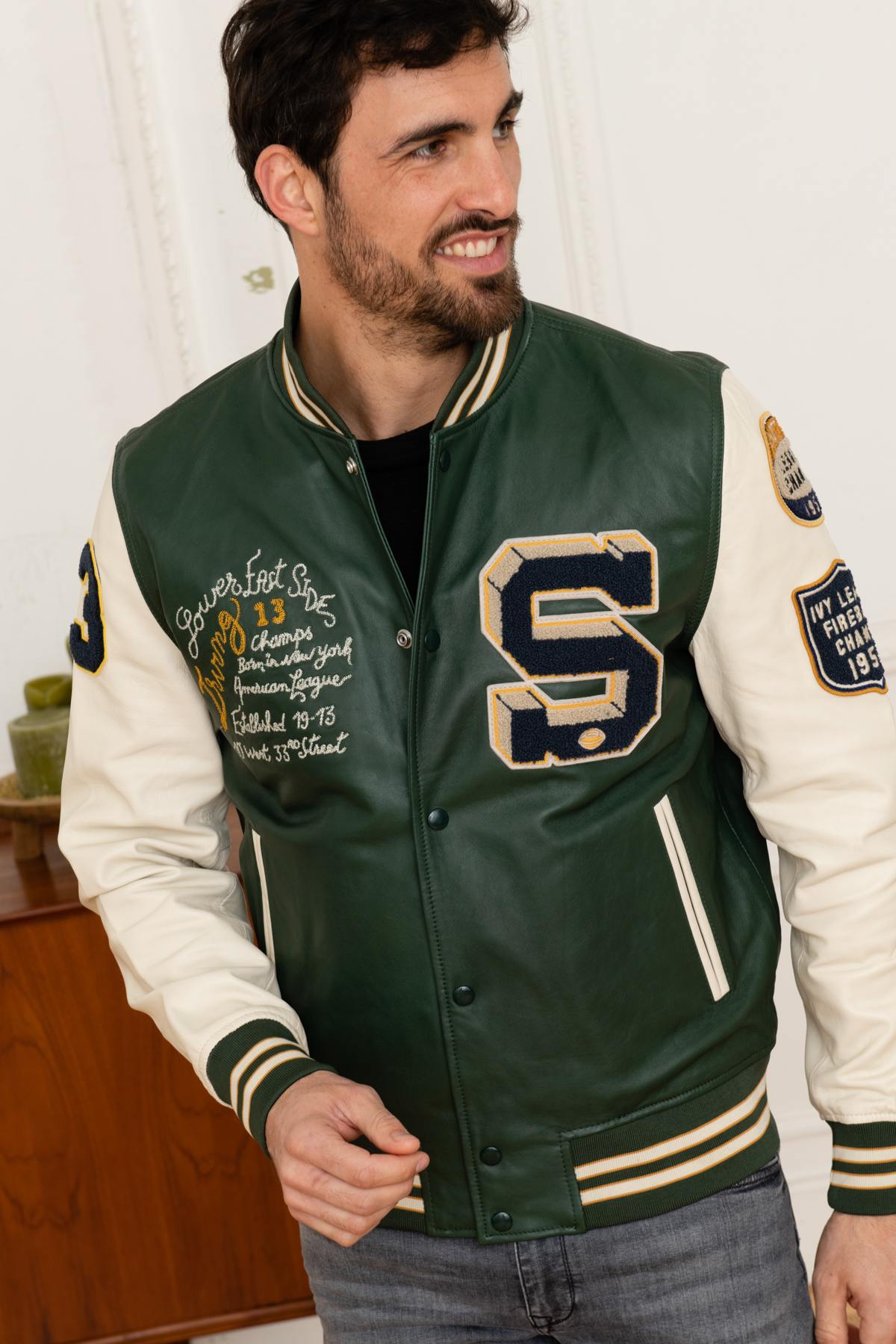 Varsity jacket in green and white leather - Image n°1