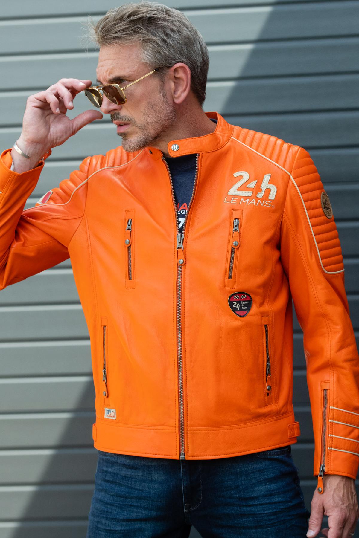 Racing-style jacket in orange leather - Image n°1