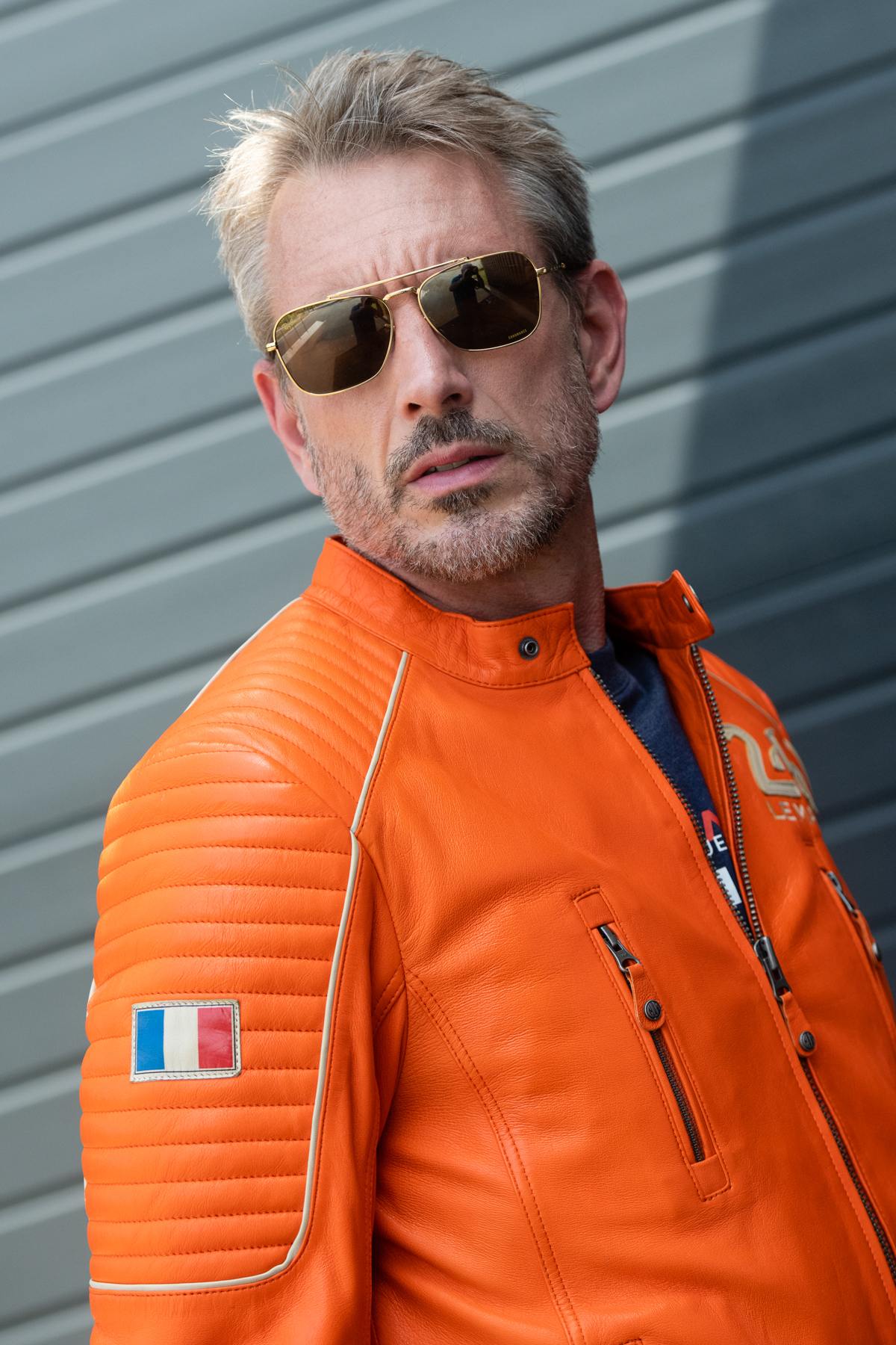 Racing-style jacket in orange leather - Image n°6