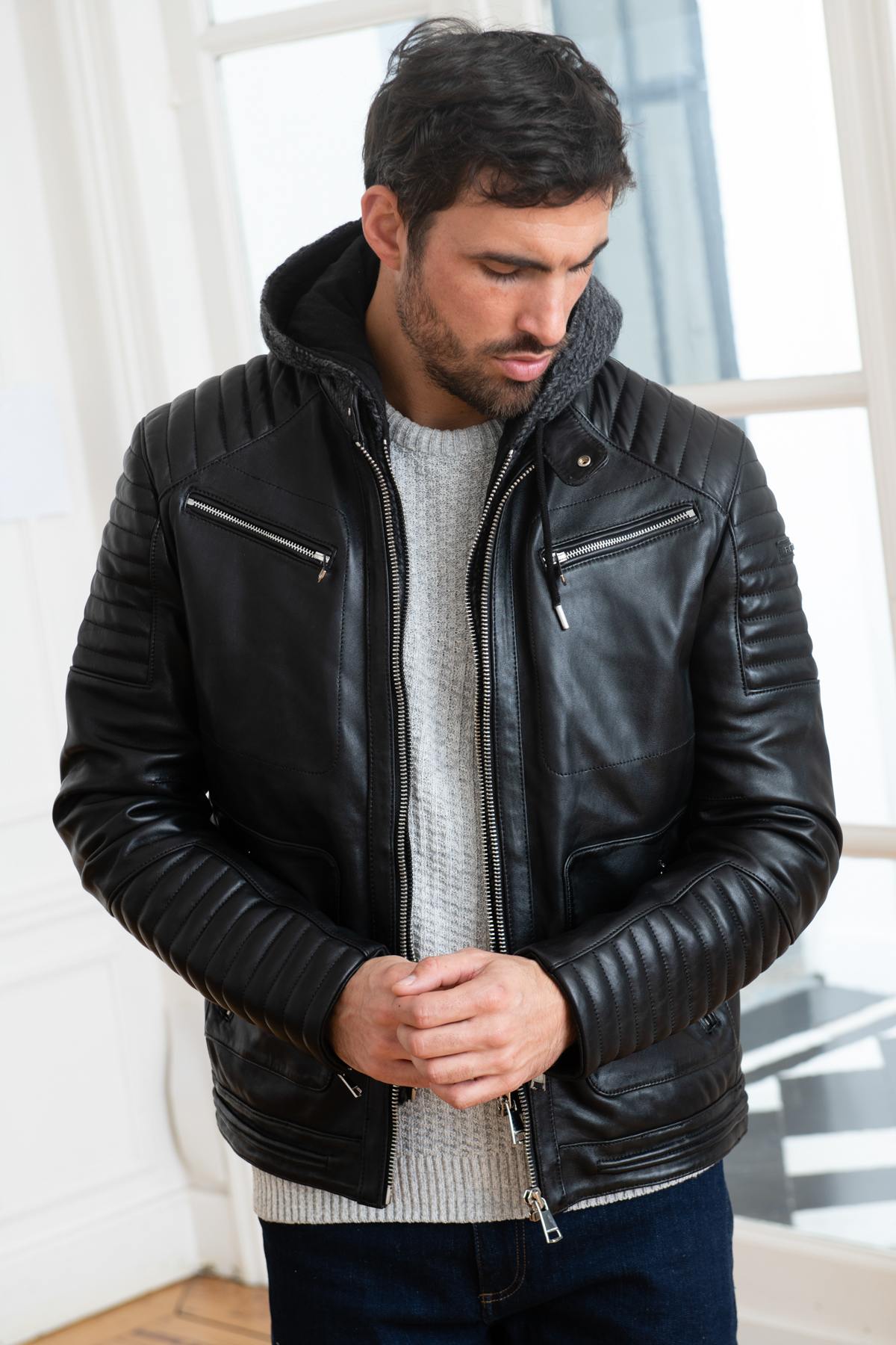 Biker-style leather jacket with wool lining - Image n°1