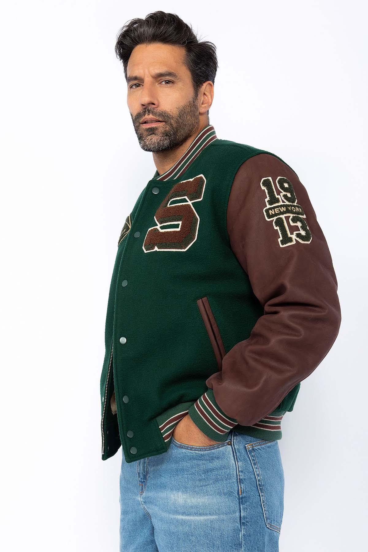 Varsity jacket in burgundy leather and green wool - Image n°1