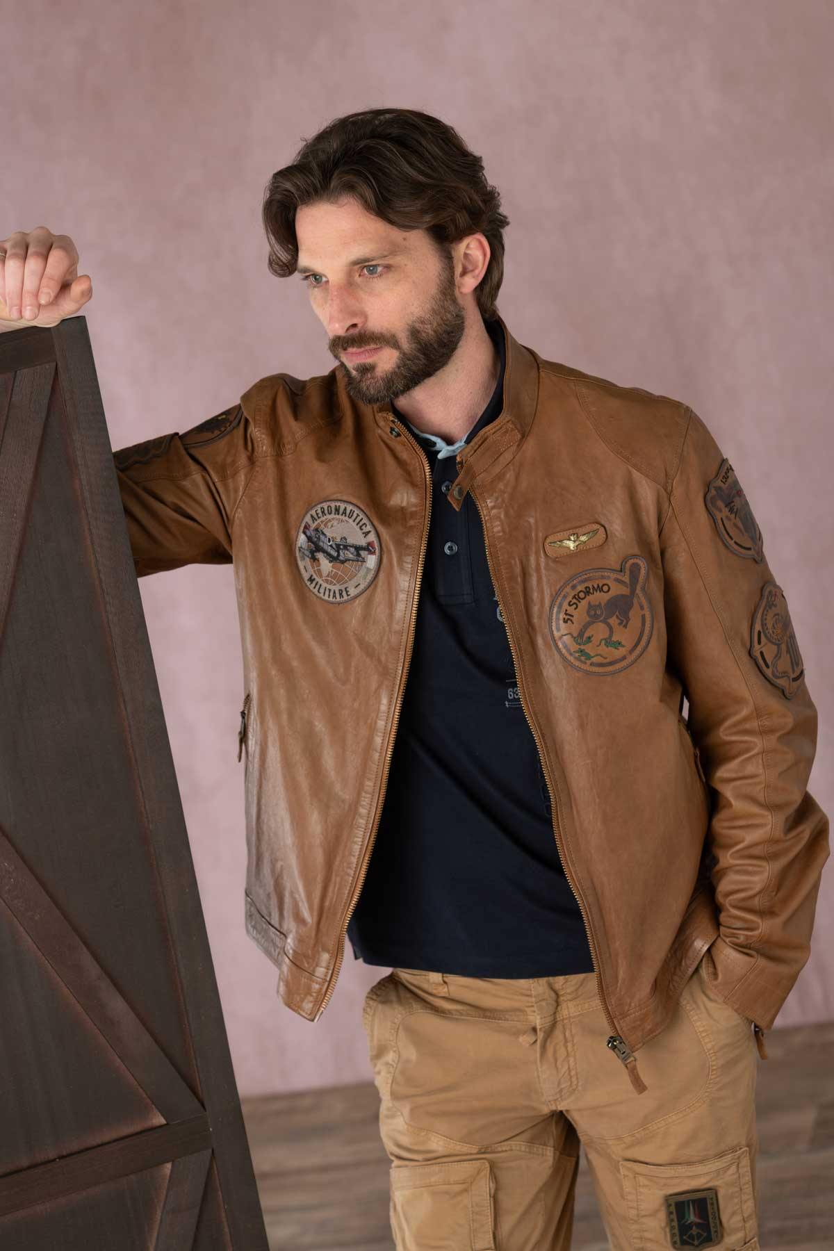 Leather bomber jacket with patches - Image n°1