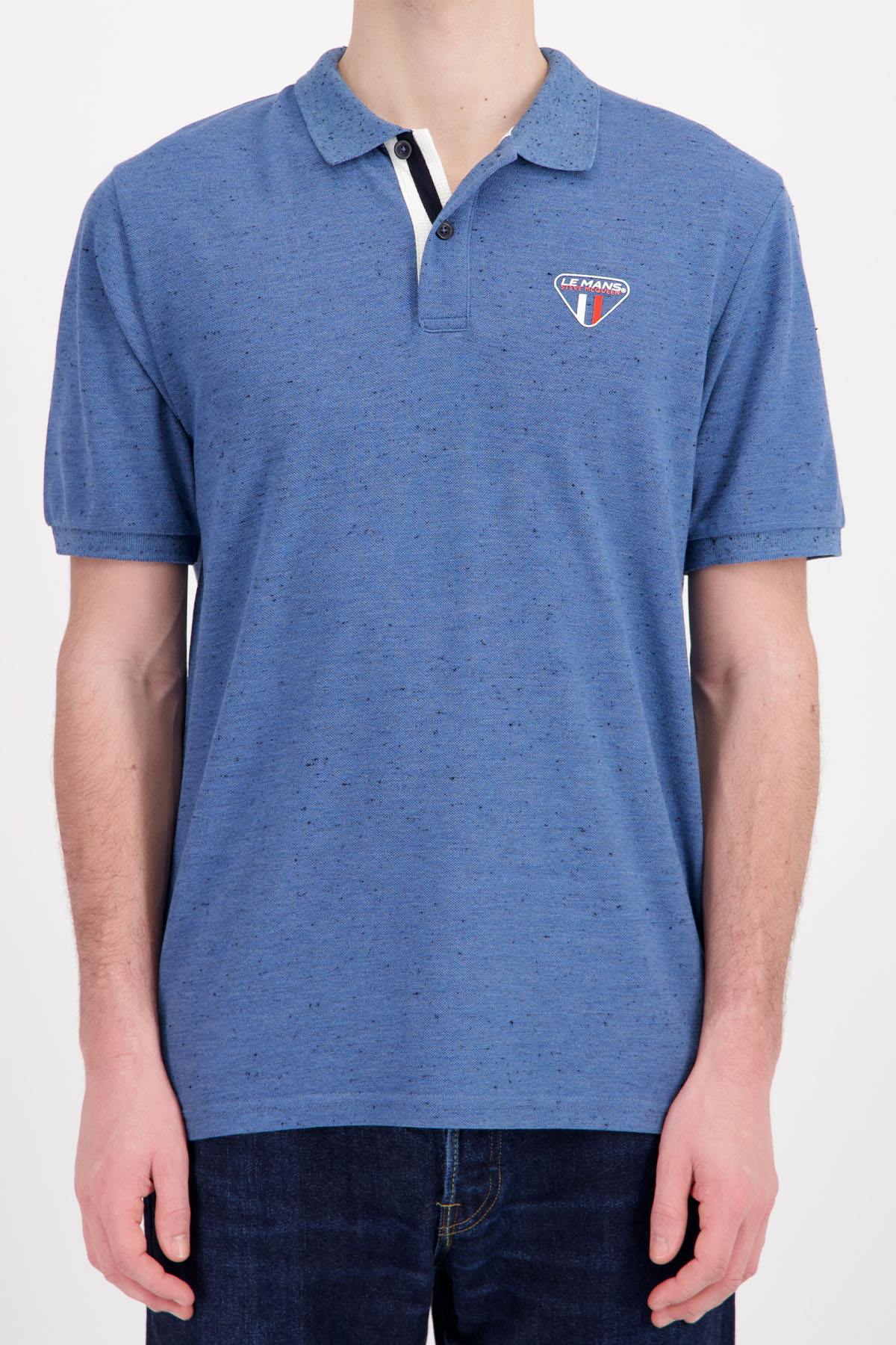 Steve McQueen injected blue polo shirt - Image n°1