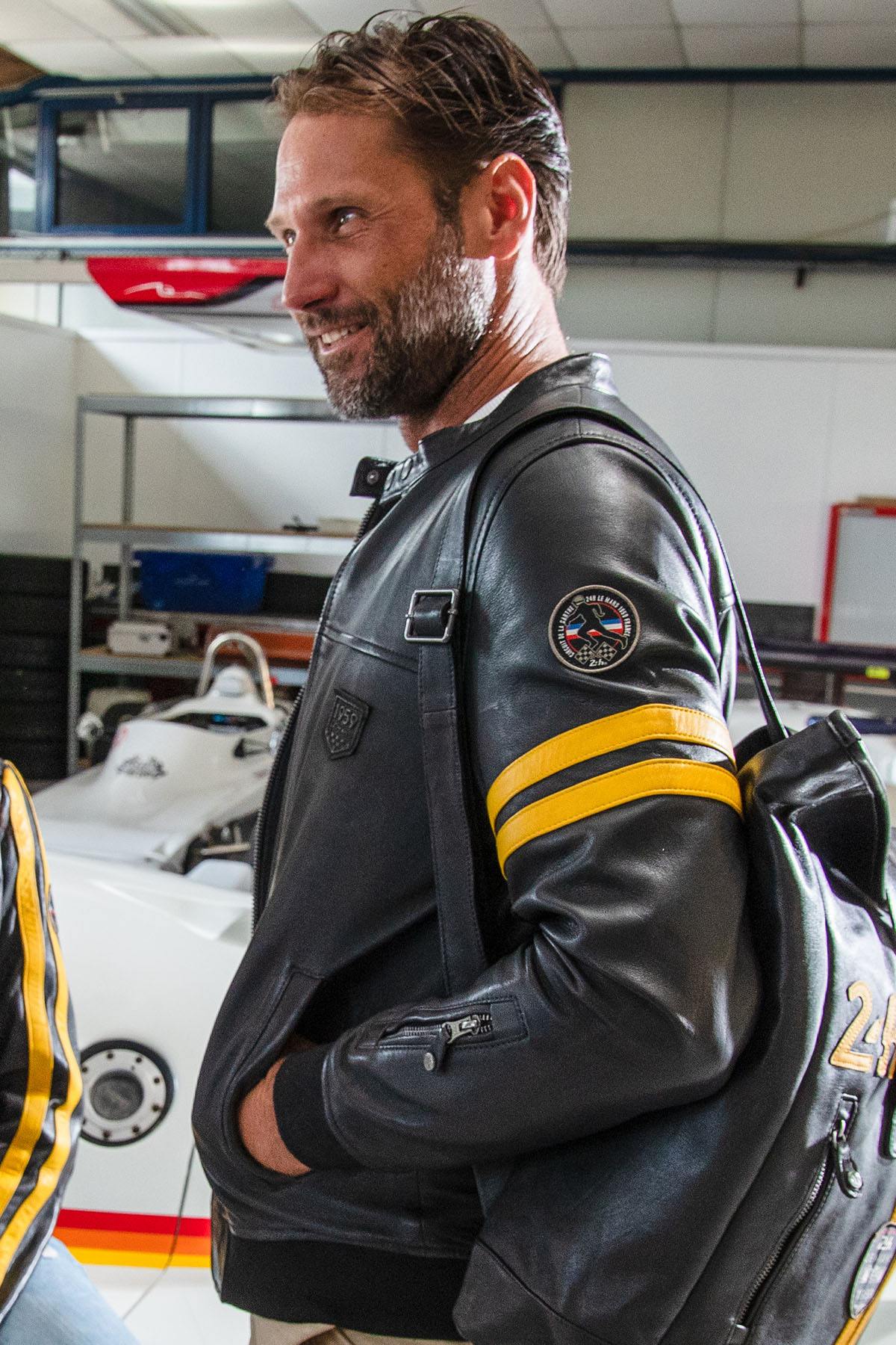 Black leather racing jacket with yellow details - Image n°2