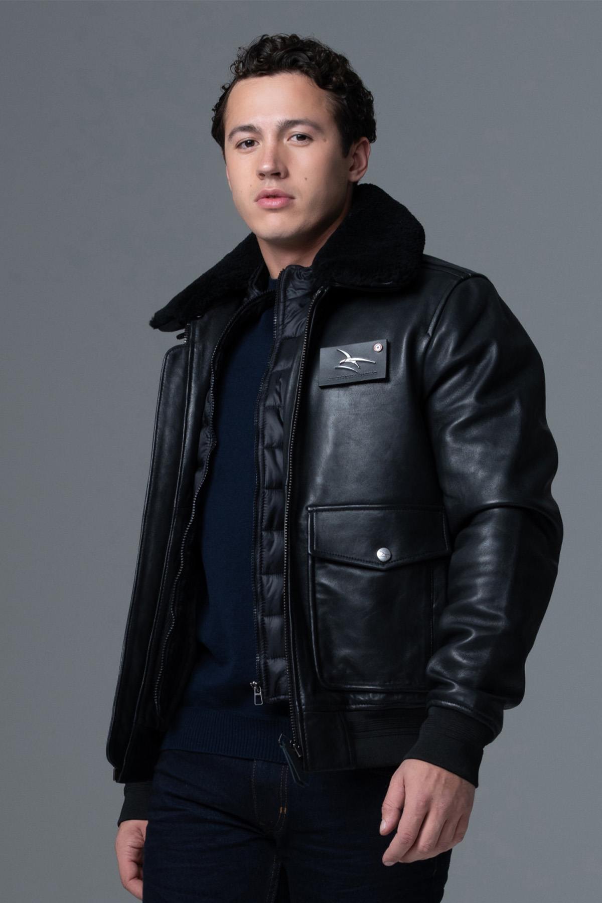 Black leather bomber jacket with premium finishes - Image n°1