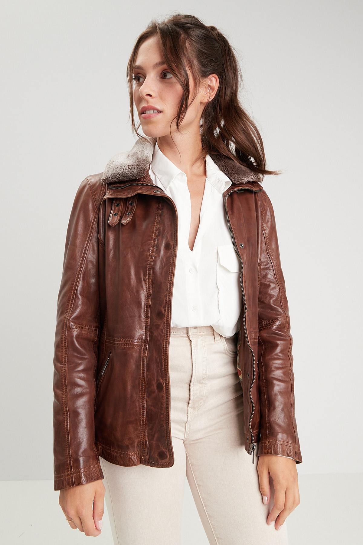 Leather jacket with stand-up collar and removable fur in bison color - Image n°1