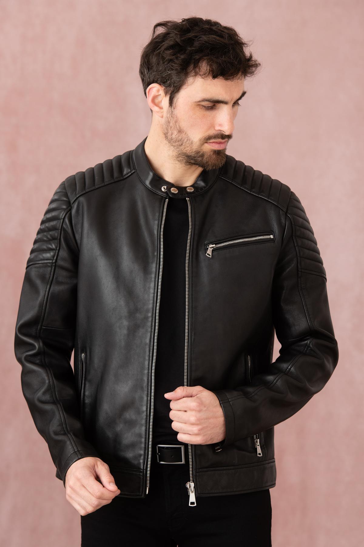 Black leather jacket with biker collar and stitching on the shoulders - Image n°1