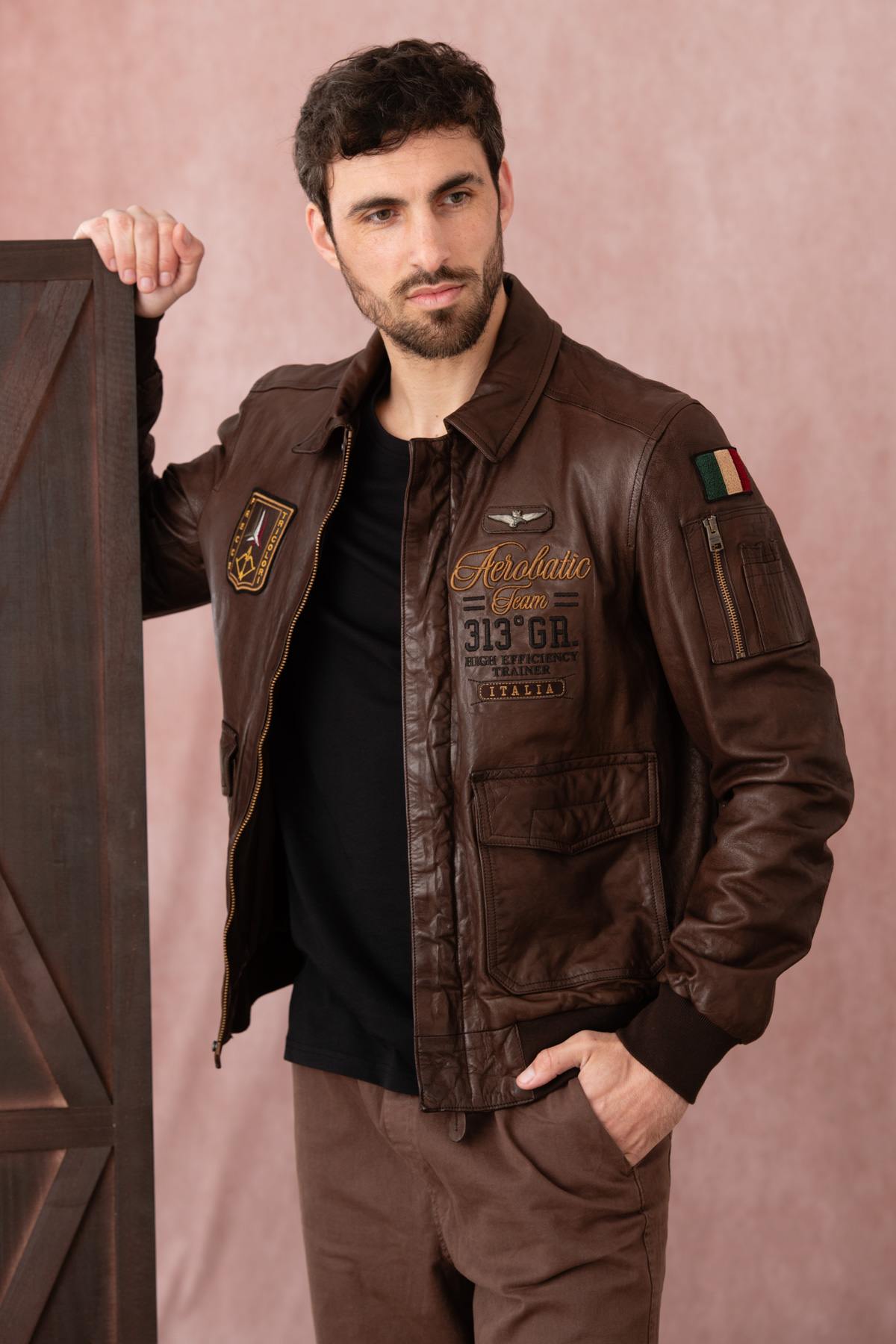 Embroidered brown leather bomber jacket - Image n°1