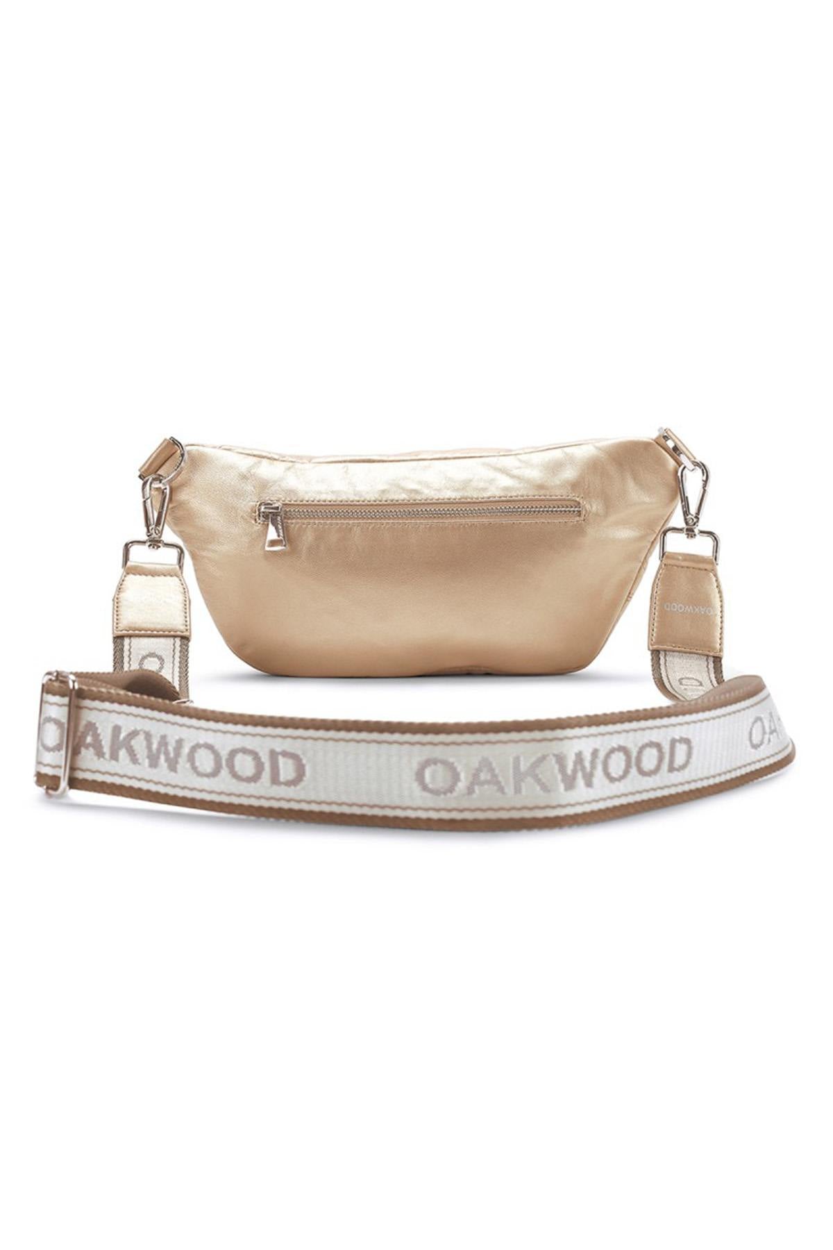 Shoulder bag in light gold metallic-look leather - Image n°1