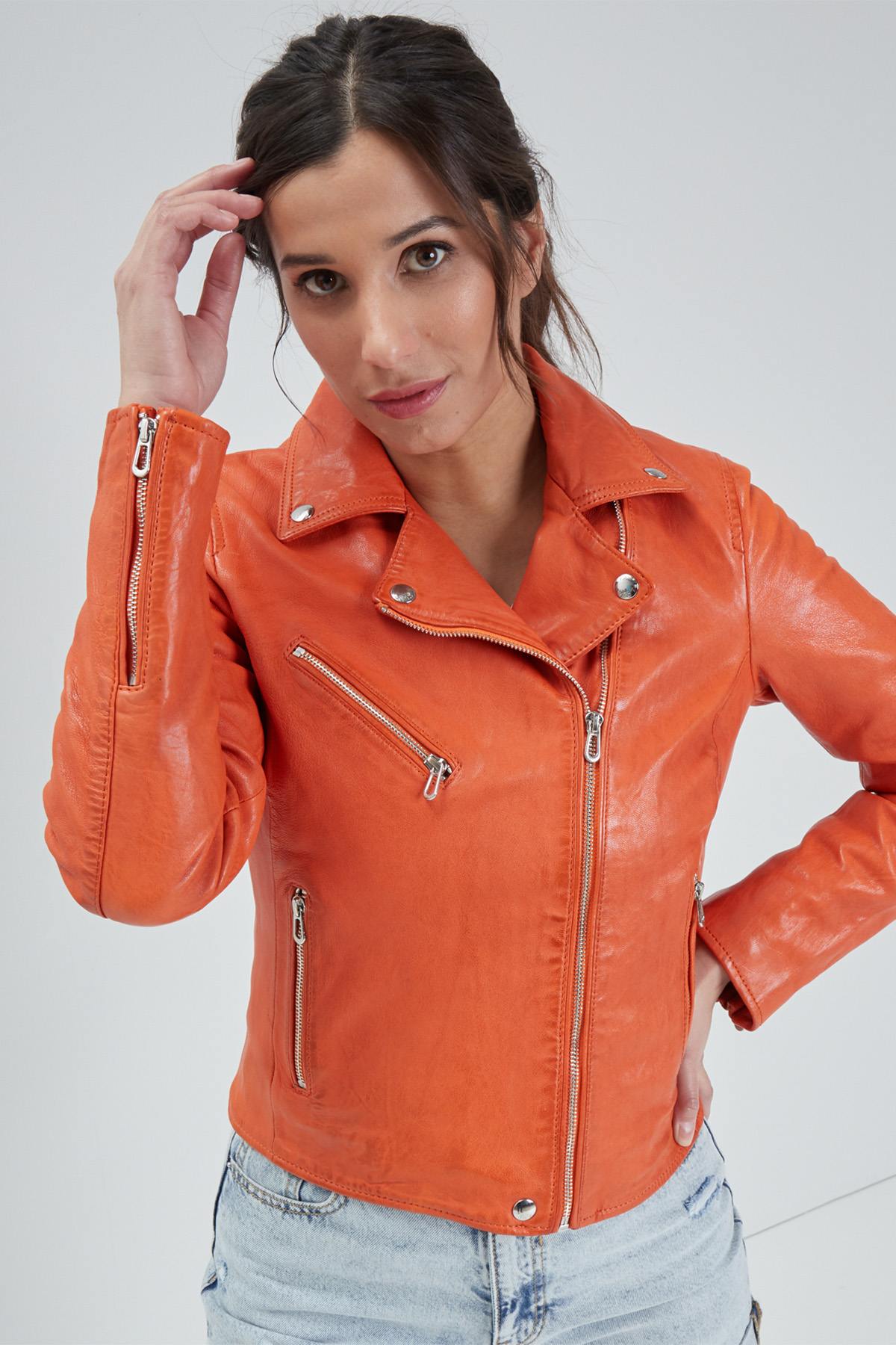 Orange perf style leather jacket for women - Image n°1