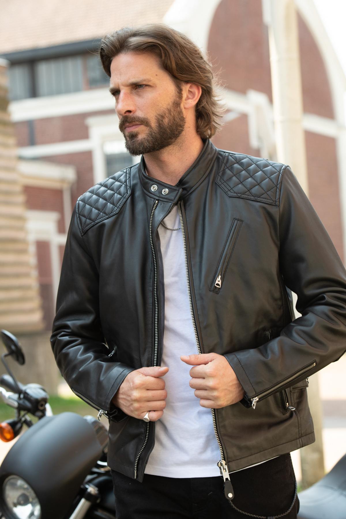 Leather jacket with biker collar and quilted shoulders - Image n°1