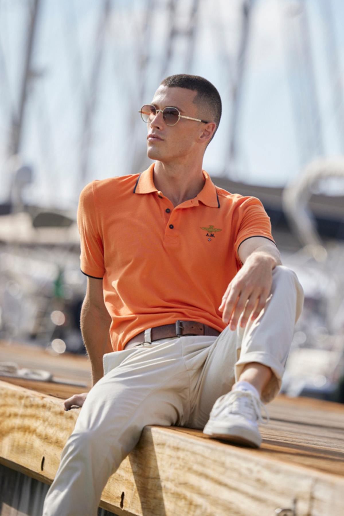 Orange short-sleeved cotton polo shirt - Image n°1