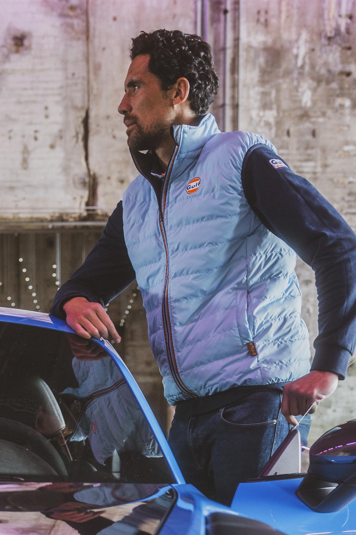 Blue reversible sleeveless down jacket - Image n°1