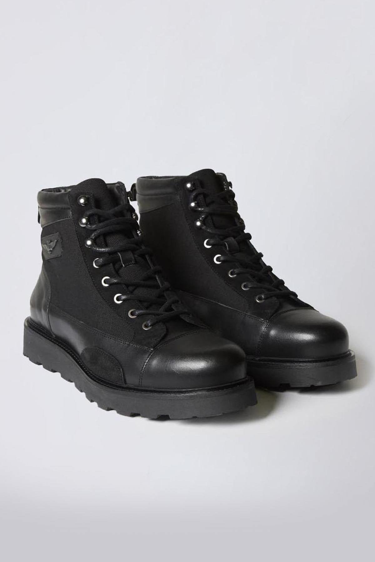 Black leather and canvas lace-up boots - Image n°1