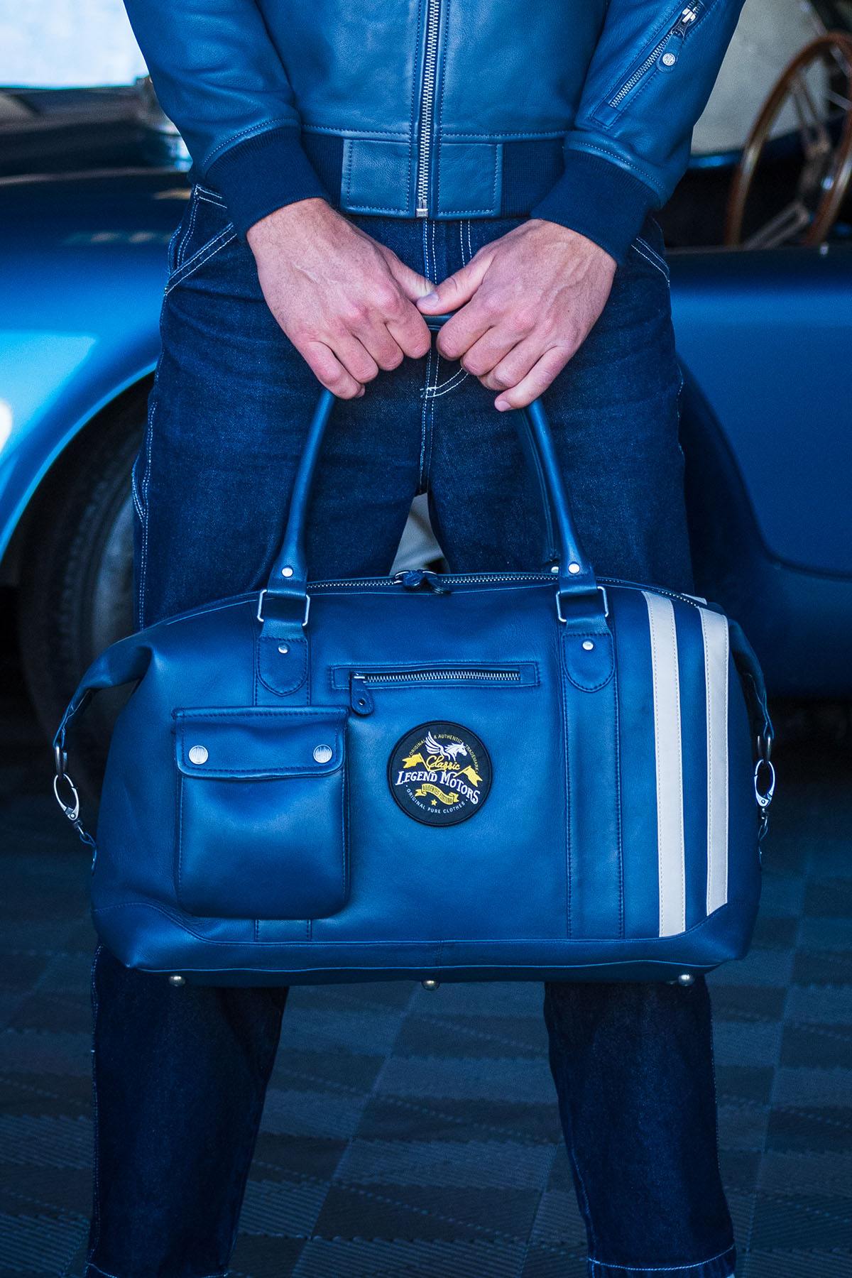 Customisable blue leather travel bag - Image n°1