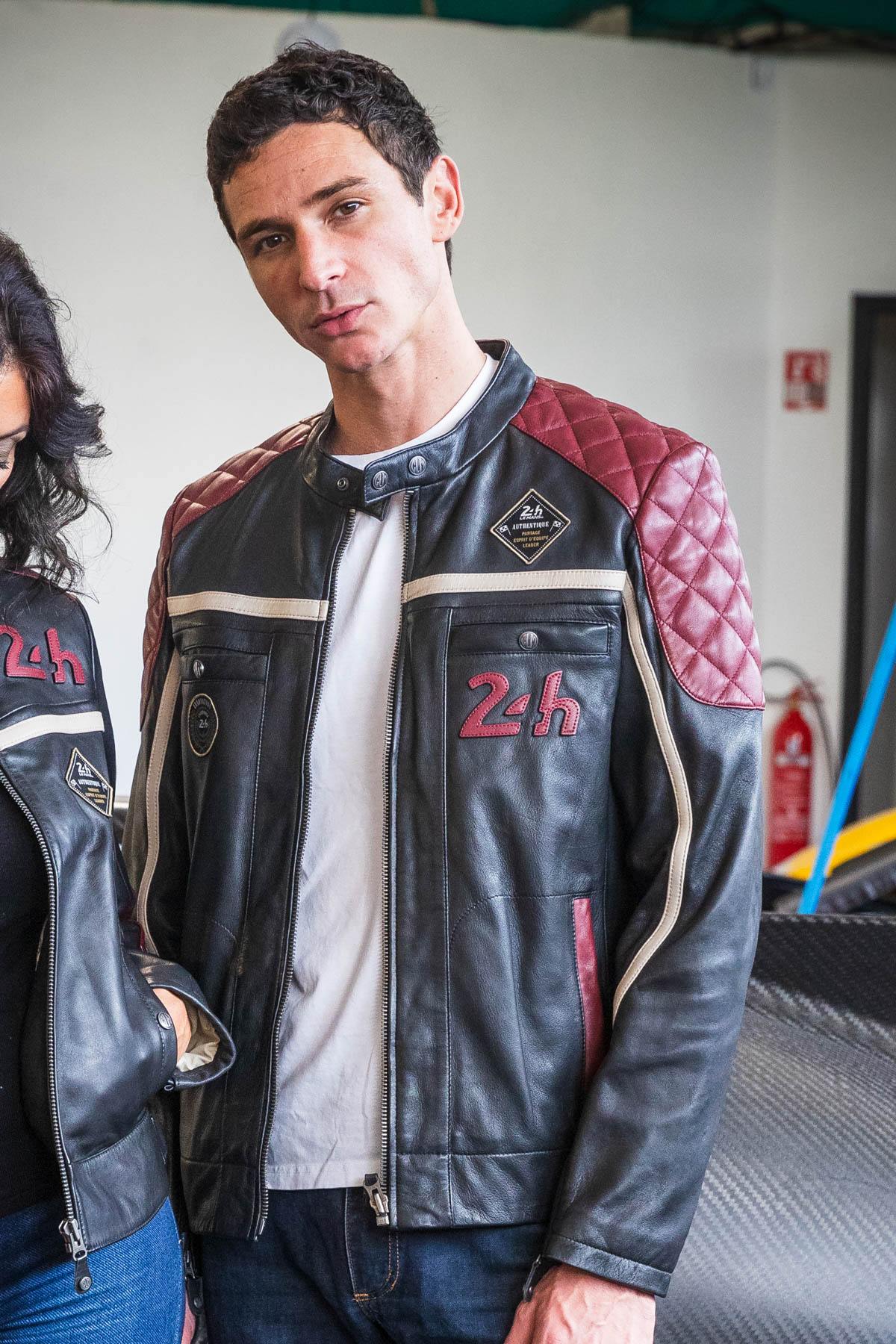 Black leather jacket with red inserts and quilted shoulders - Image n°1