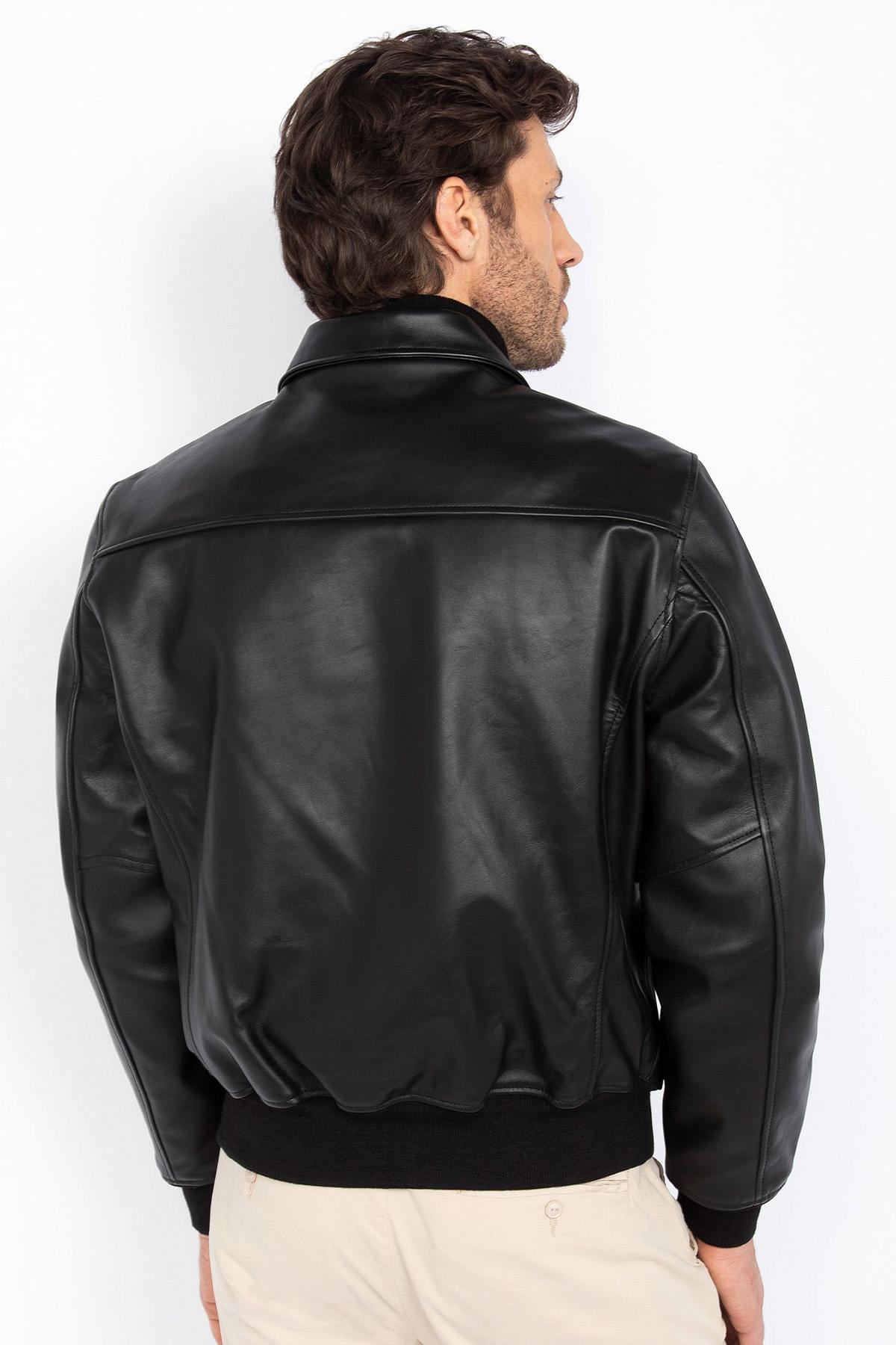 Black leather jacket with shirt collar and ribbed edges - Image n°3