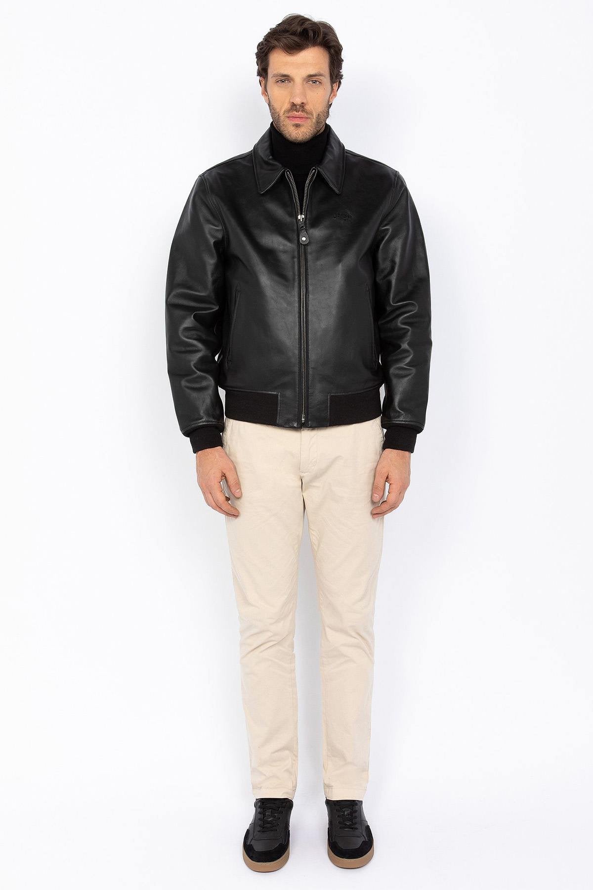 Black leather jacket with shirt collar and ribbed edges - Image n°7