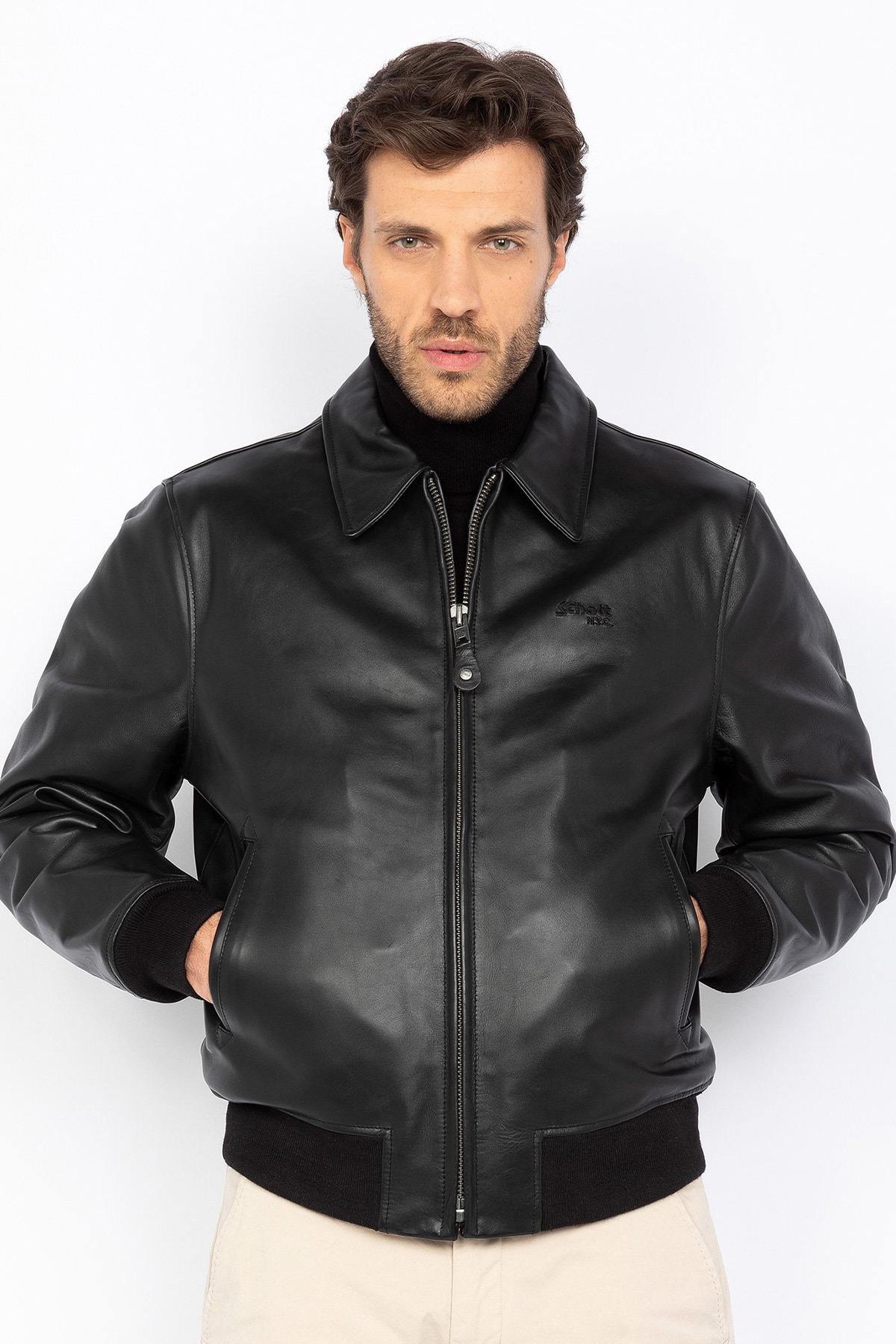 Black leather jacket with shirt collar and ribbed edges - Image n°1