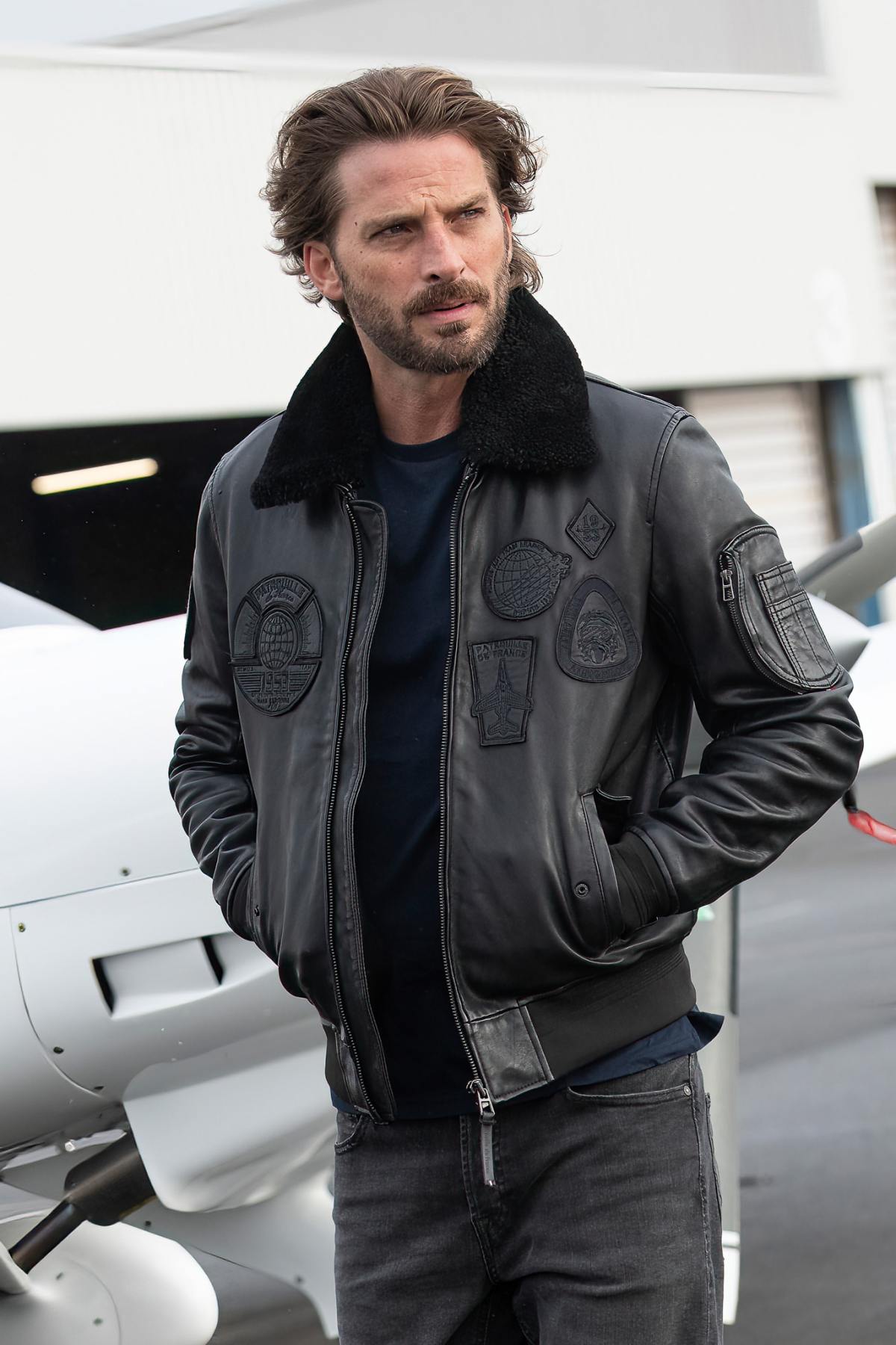 Men's black leather bomber jacket with black patches - Image n°2