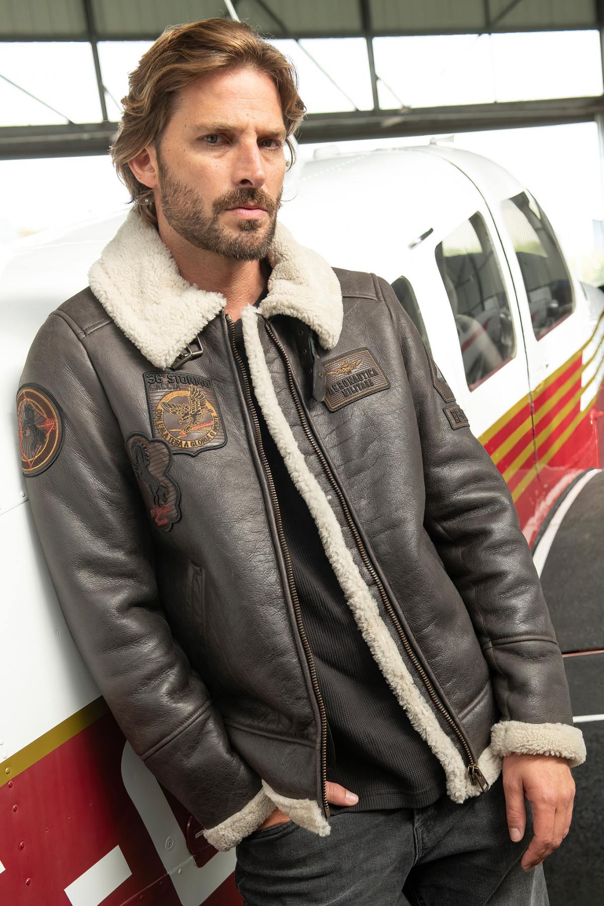 Shearling bomber jacket with patches - Image n°1