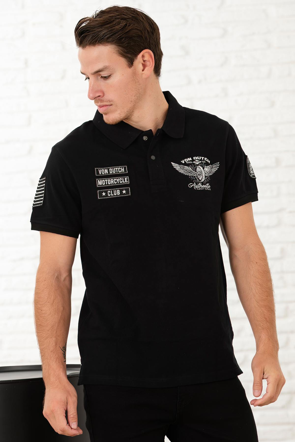 Black cotton polo shirt with white patches - Image n°1