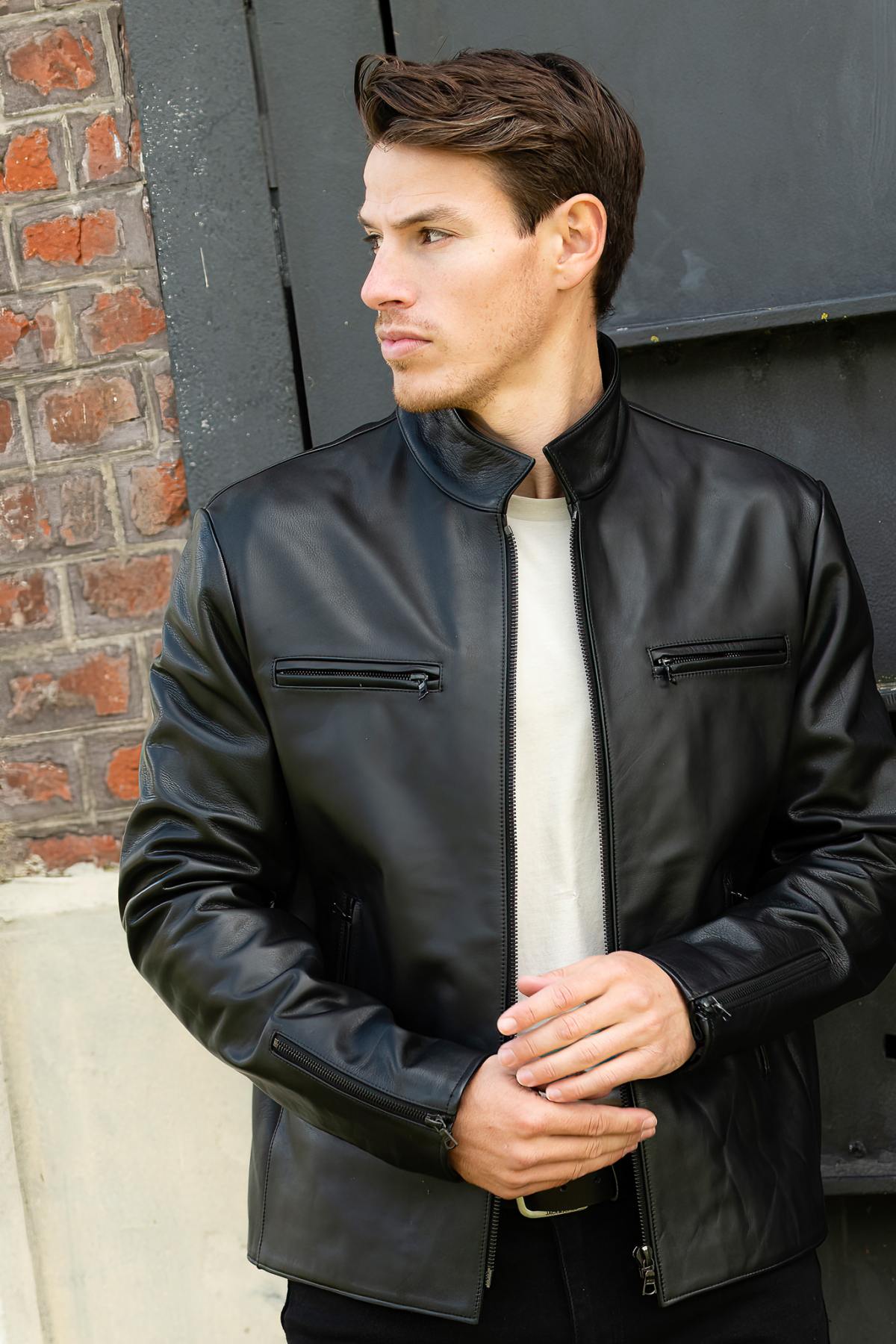 Sleek full black biker leather jacket - Image n°1