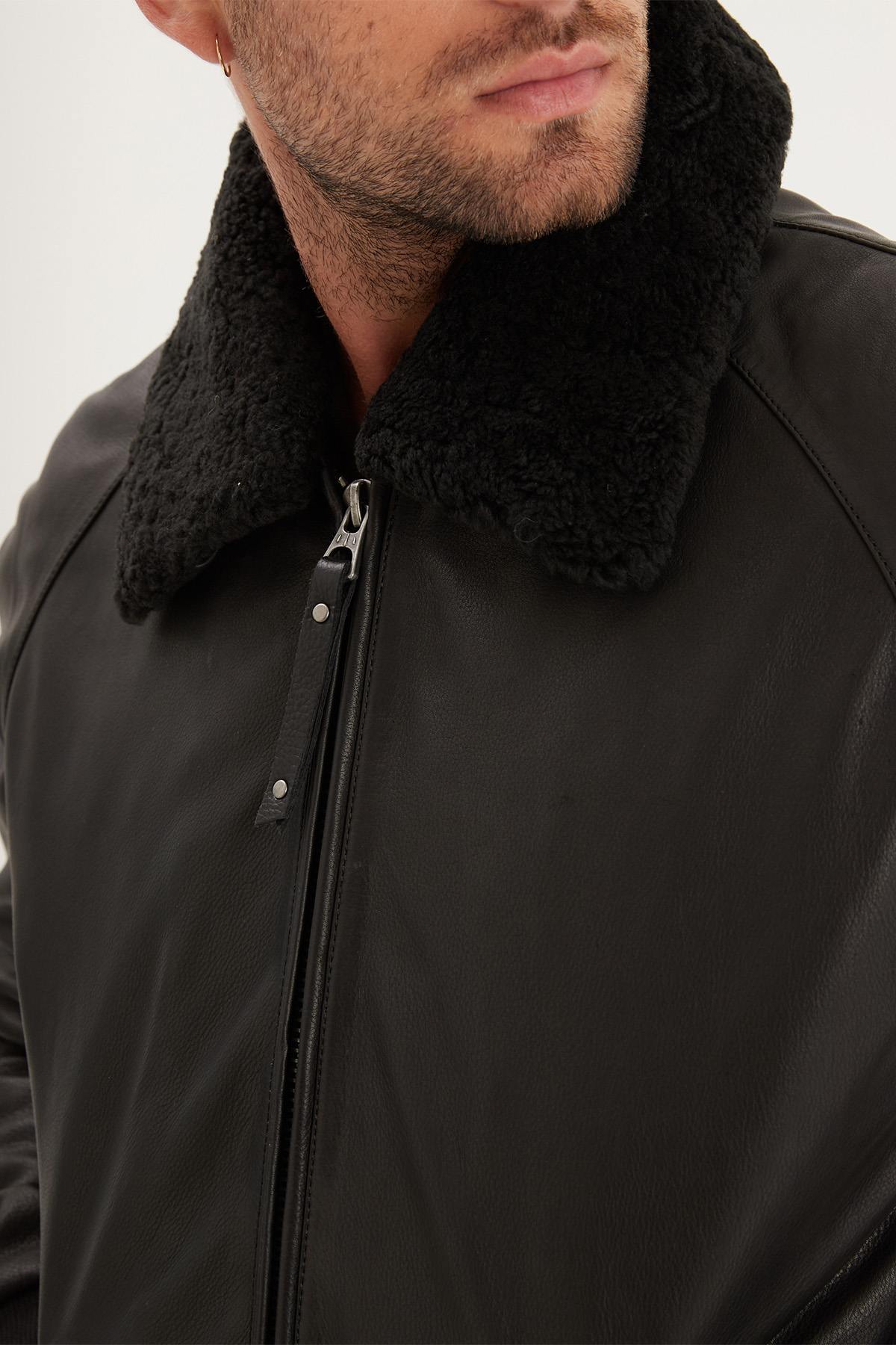 Black thick leather bomber jacket with fur collar - Image n°3