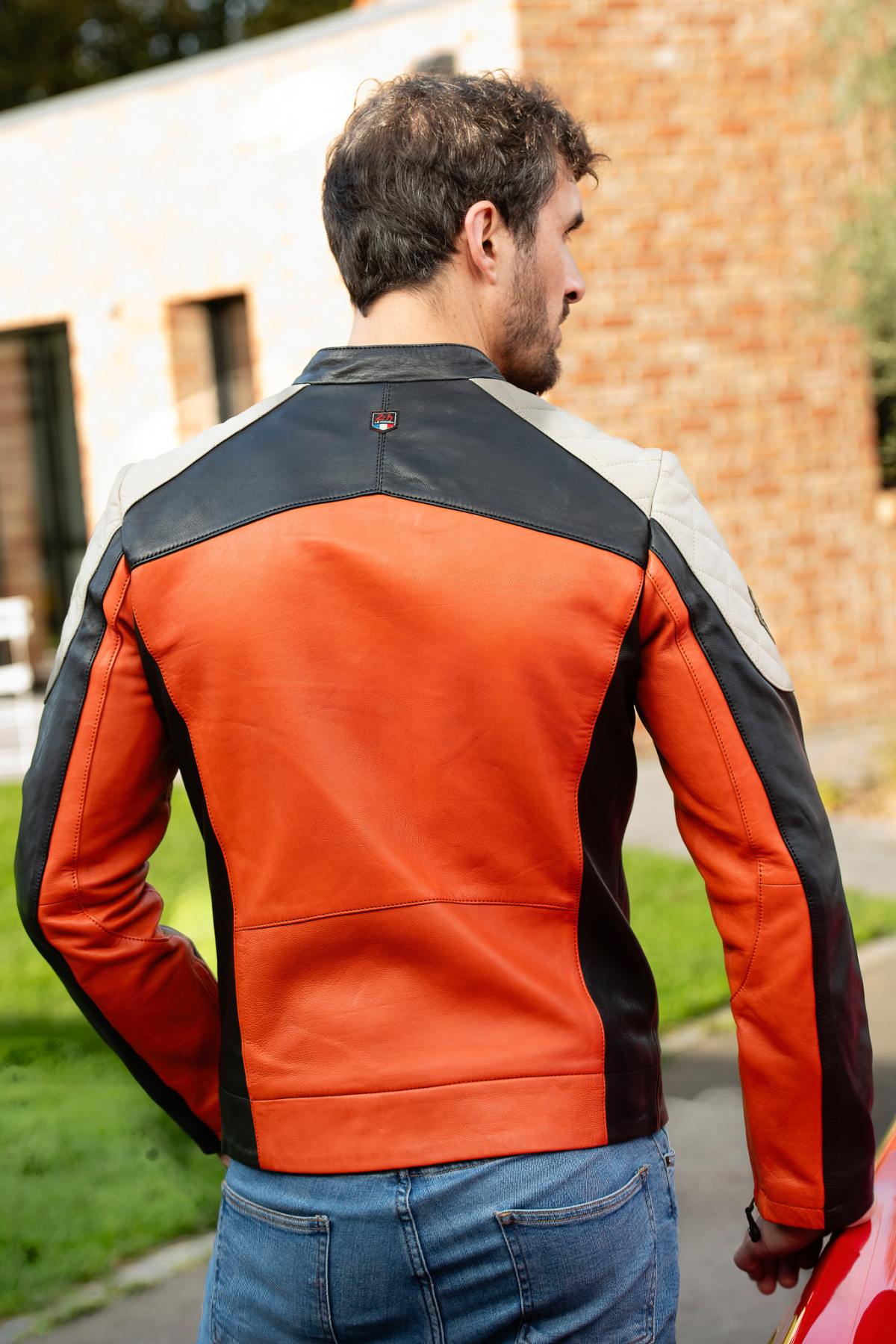 Orange, black and ecru racing leather jacket - Image n°3