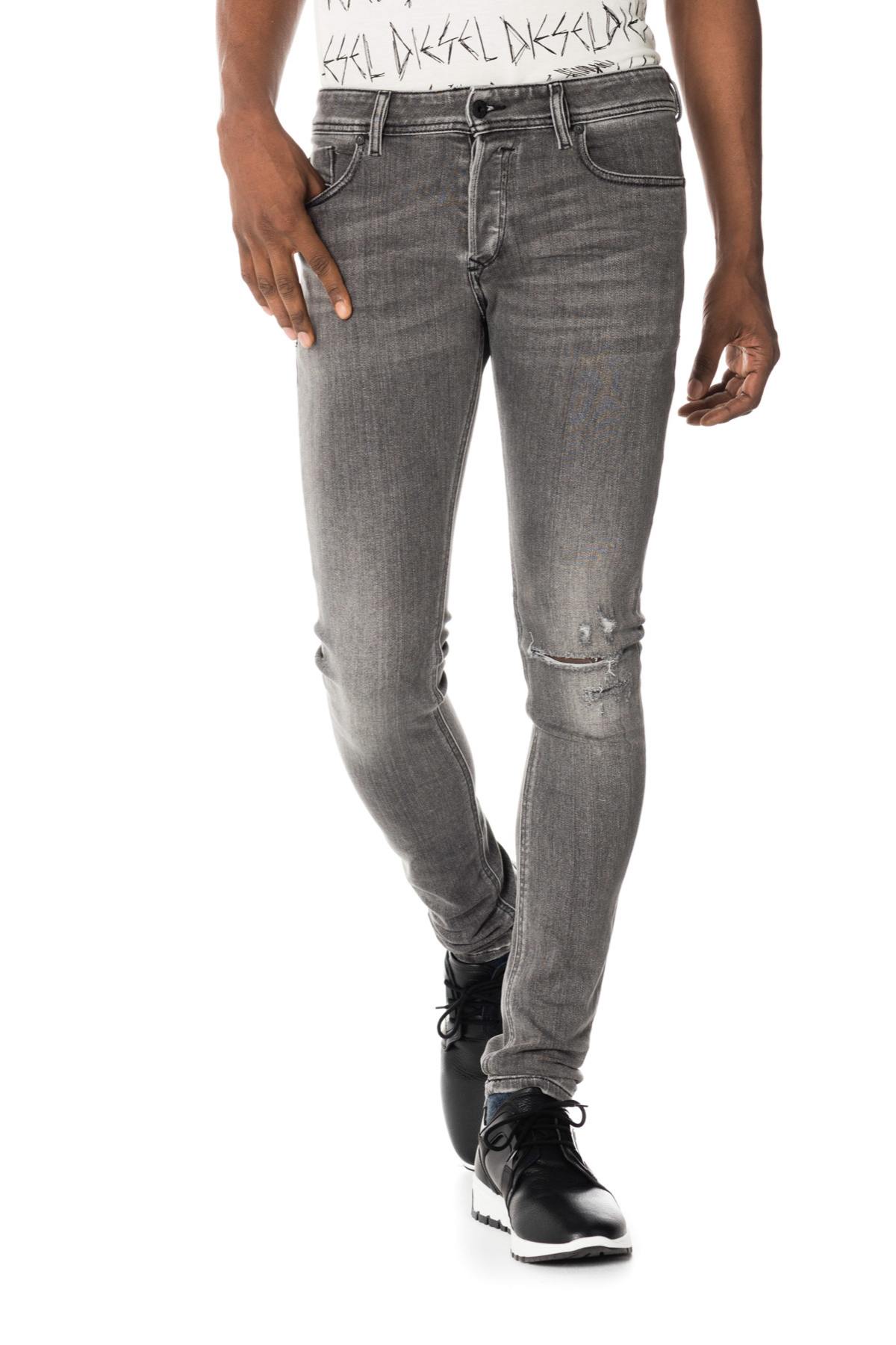 Diesel men's jeans worn and torn - Image n°1